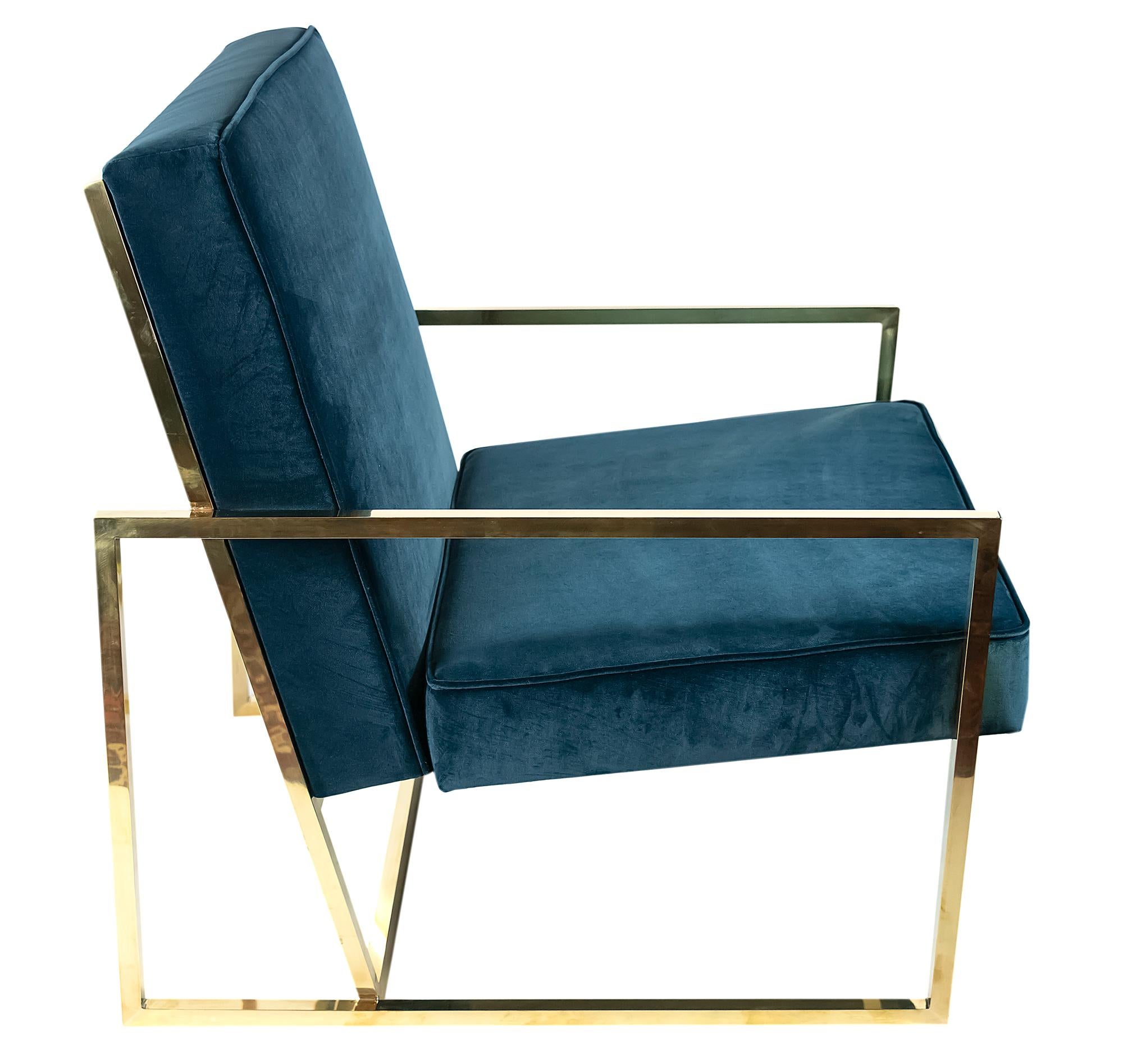 The pair of armchairs are made in midcentury design, brass frame and plush dark velour cushions. The armchairs are heavy, stabile and comfortable.
 