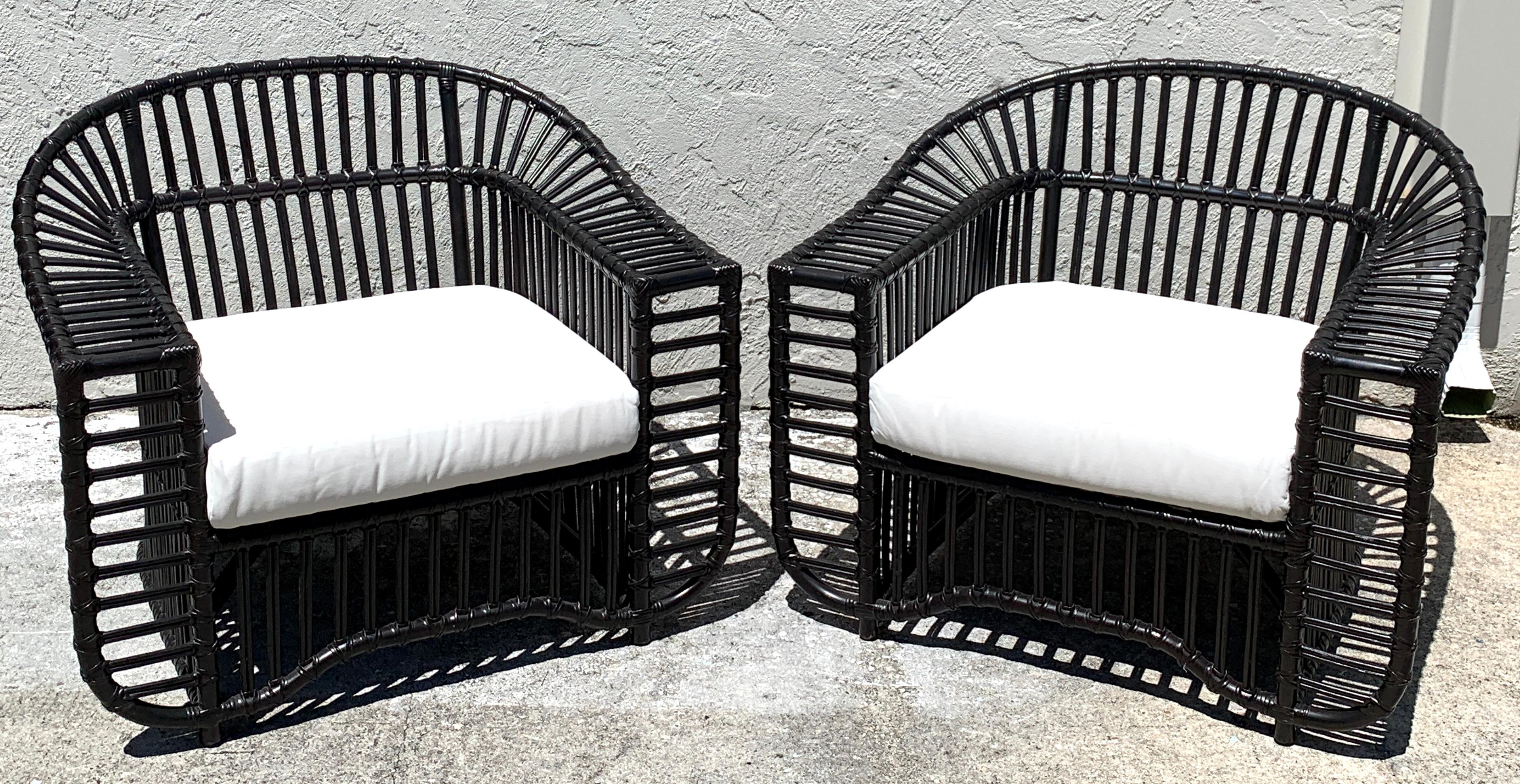 Pair of midcentury ebonized rattan club chairs by Henry Olko, restored
Each one sculptural, beautifully made complete with duck cloth cushions
Each chair measures 32