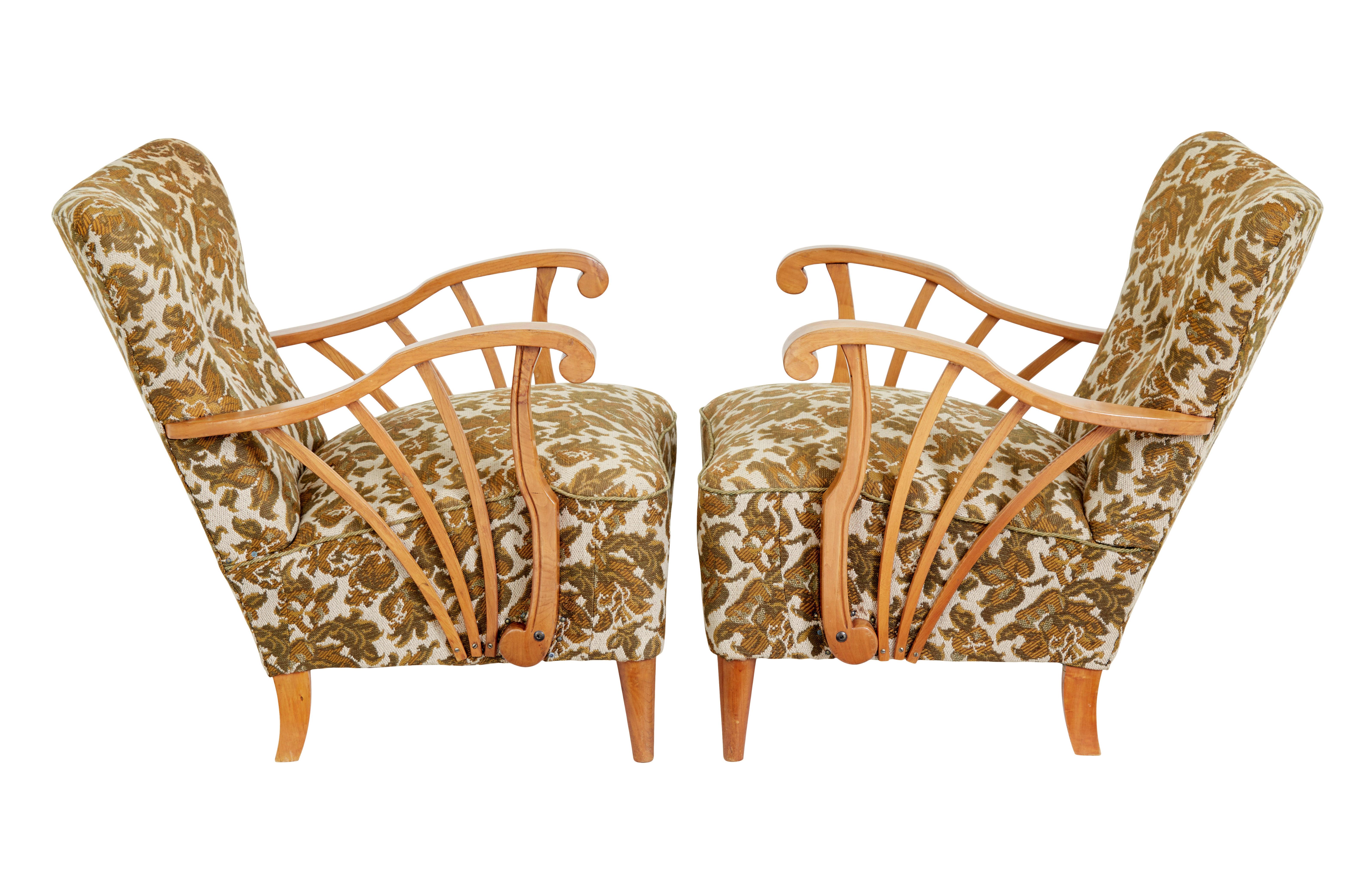 20th Century Pair of mid century elm Scandinavian armchairs For Sale