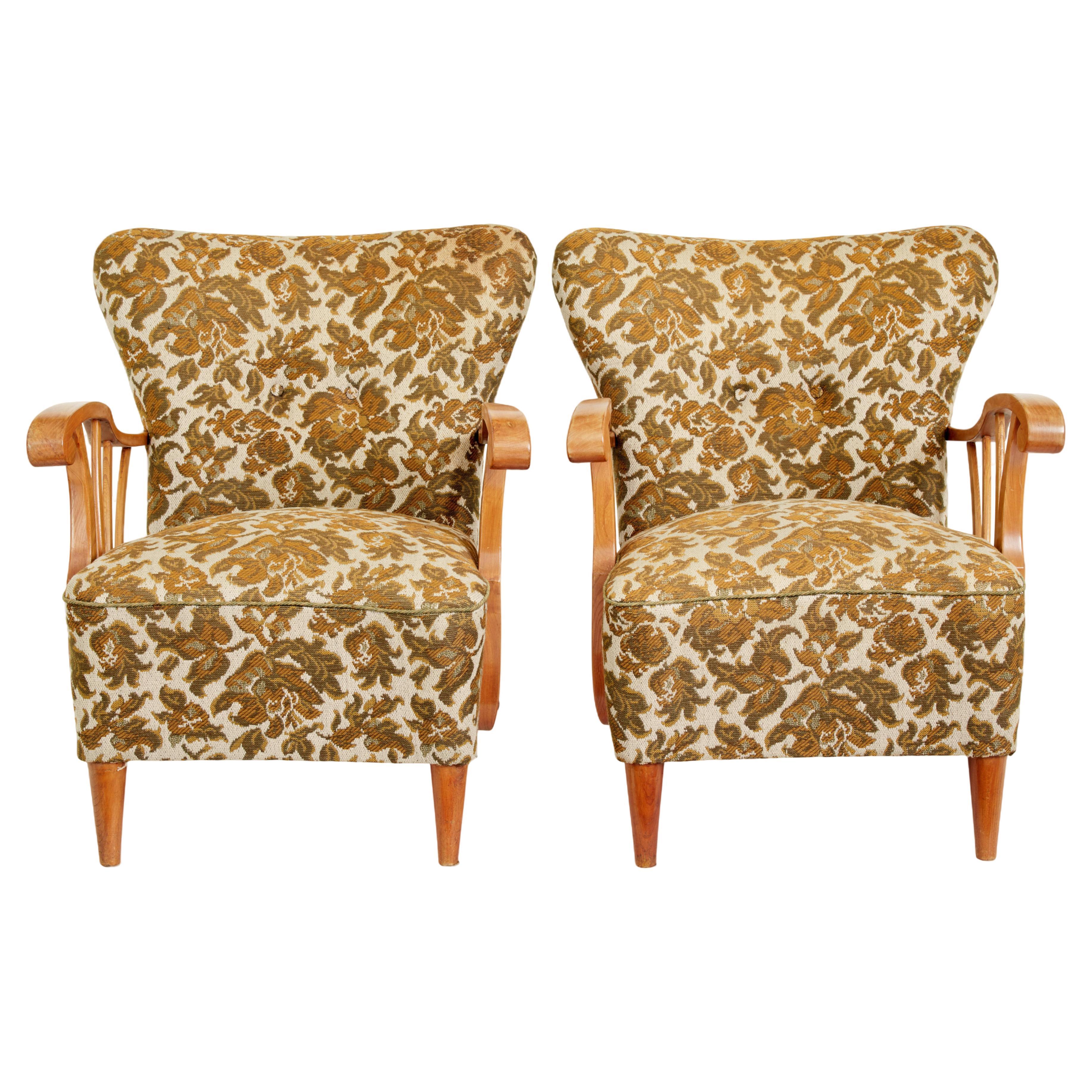 Pair of mid century elm Scandinavian armchairs For Sale