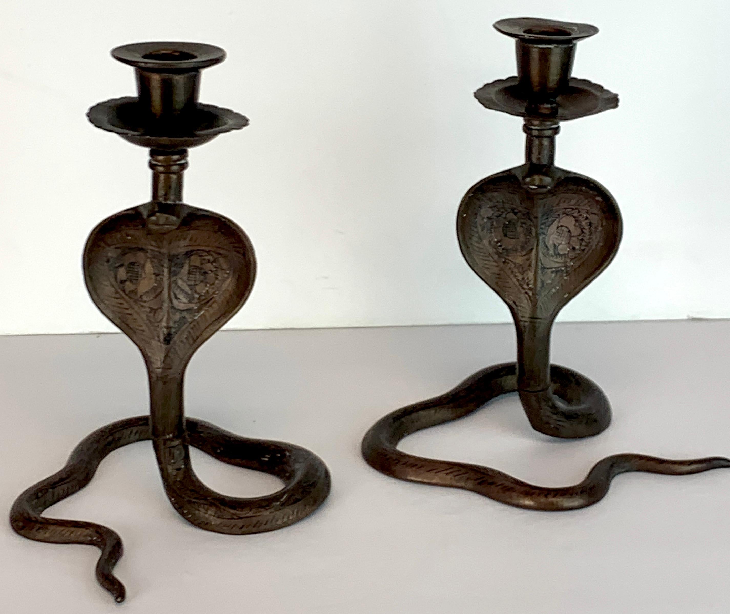 Pair of midcentury enameled brass cobra candlesticks, each realistically cast and modled, with incised enamel decoration.