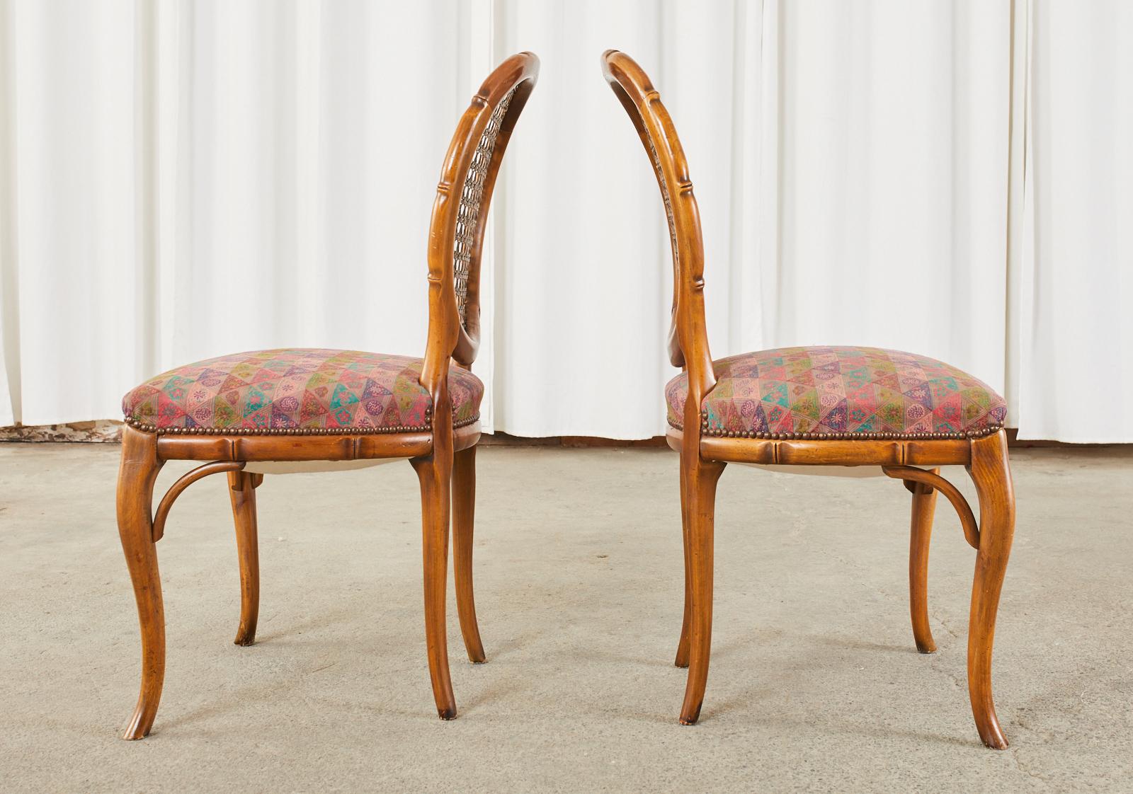 Hand-Crafted Pair of Mid-Century Faux Bamboo and Cane Dining Chairs For Sale