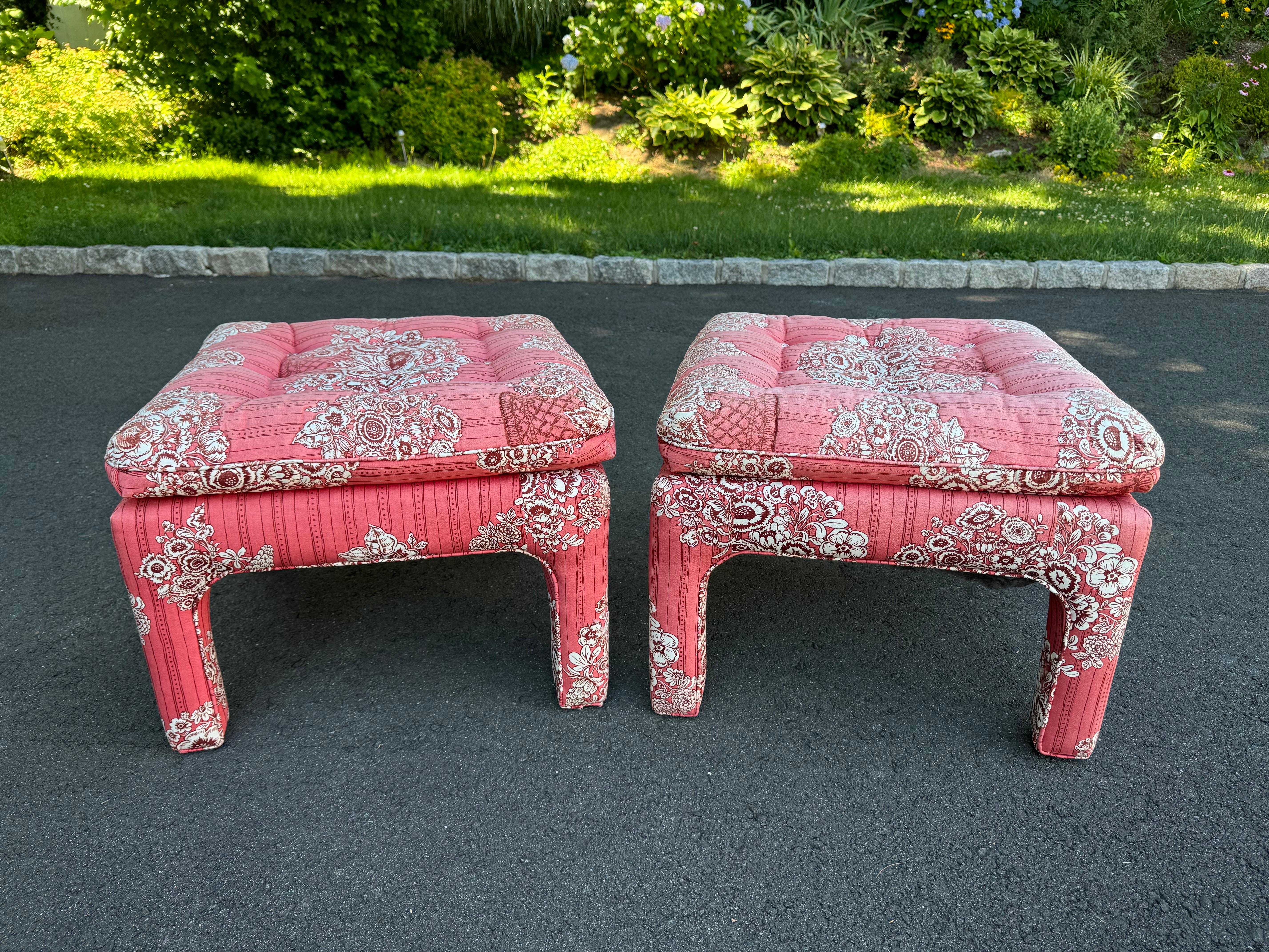 Pair of Mid Century Footstools or Ottoman. Cool quilted fabric. Matching wingback chairs also available. Red and white upholstery with some quilting. Nice square design . Solid construction.
Some fading and wear to upholstery. Please confirm