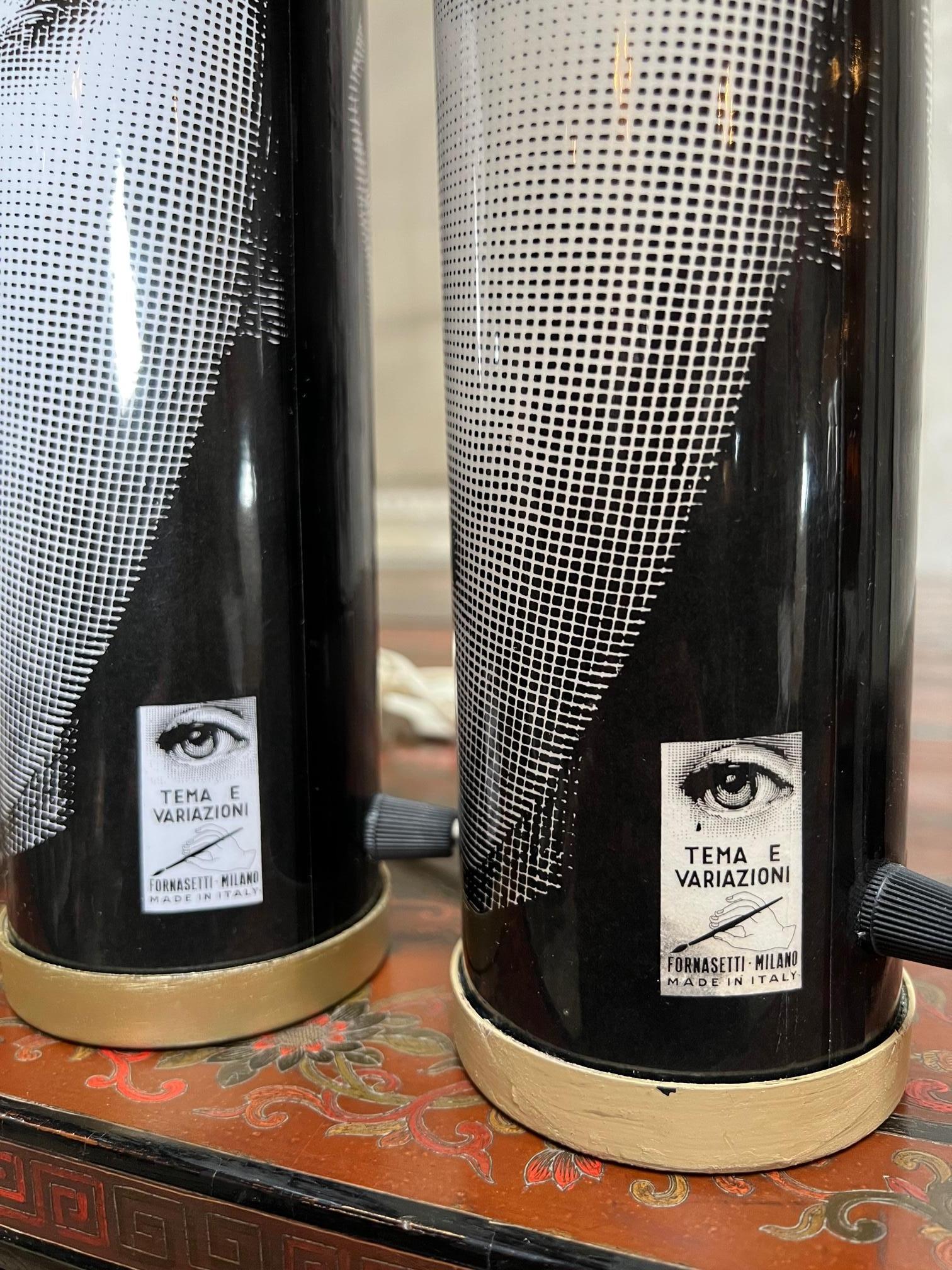 Plastic Pair of Mid Century Fornasetti Lamps For Sale