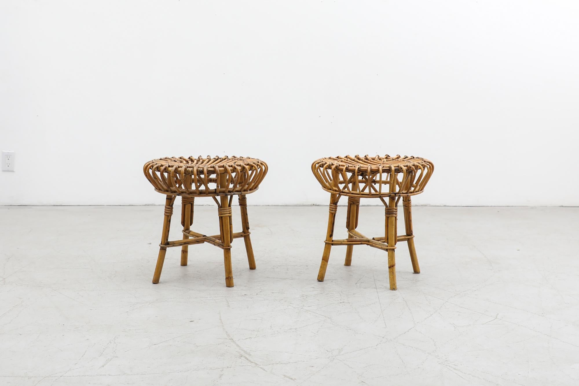 Pair of Mid-Century Bamboo Stools by Italian Mid-Century master Franco Albini, the visionary mind behind many of Cassina's most acclaimed furniture masterpieces. Hand woven and in original condition with some visible wear, consistent with their age