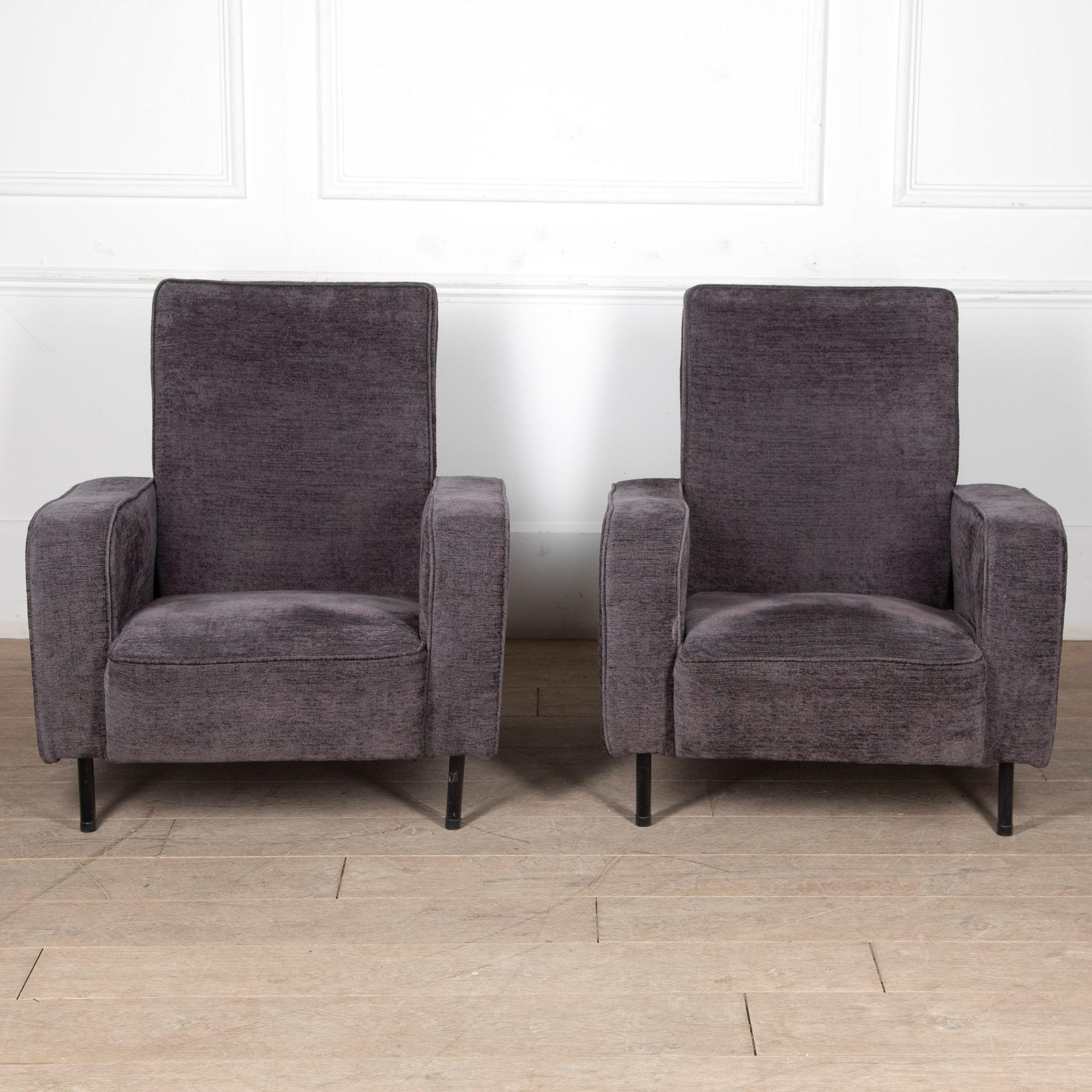 Pair of Mid-Century French armchairs attributed to Pierre Guariche by Airborne.
The airborne labels are underneath each chair.
Circa 1955.