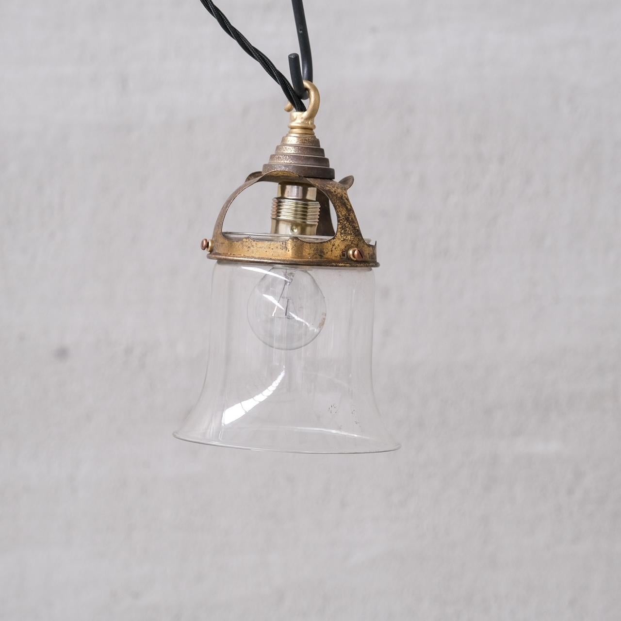 Pair of Mid-Century French Bell Shaped Clear Glass and Brass Pendants  In Good Condition For Sale In London, GB