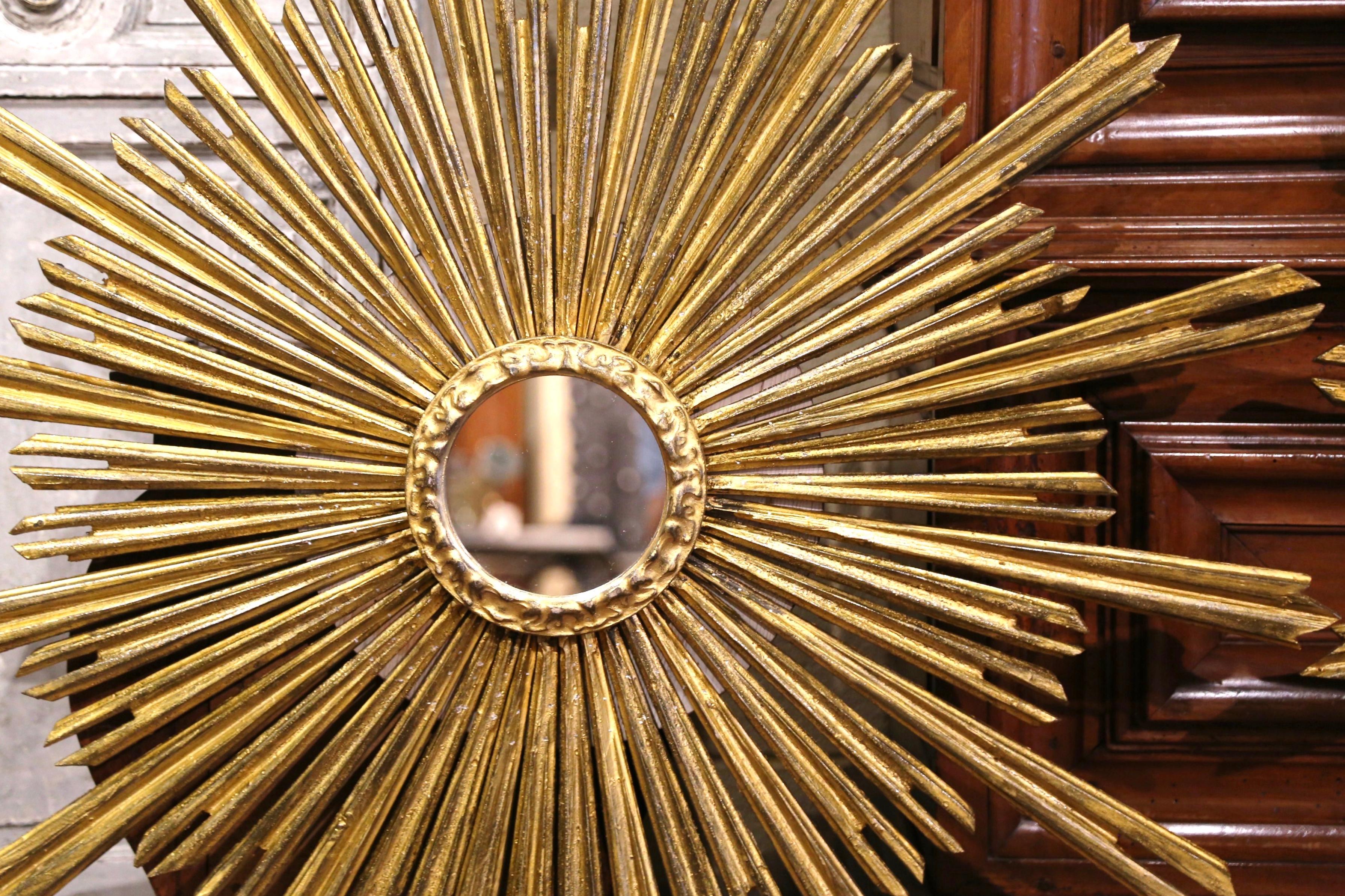 Pair of Mid-Century French Carved Giltwood Sunburst Mirrors In Excellent Condition In Dallas, TX