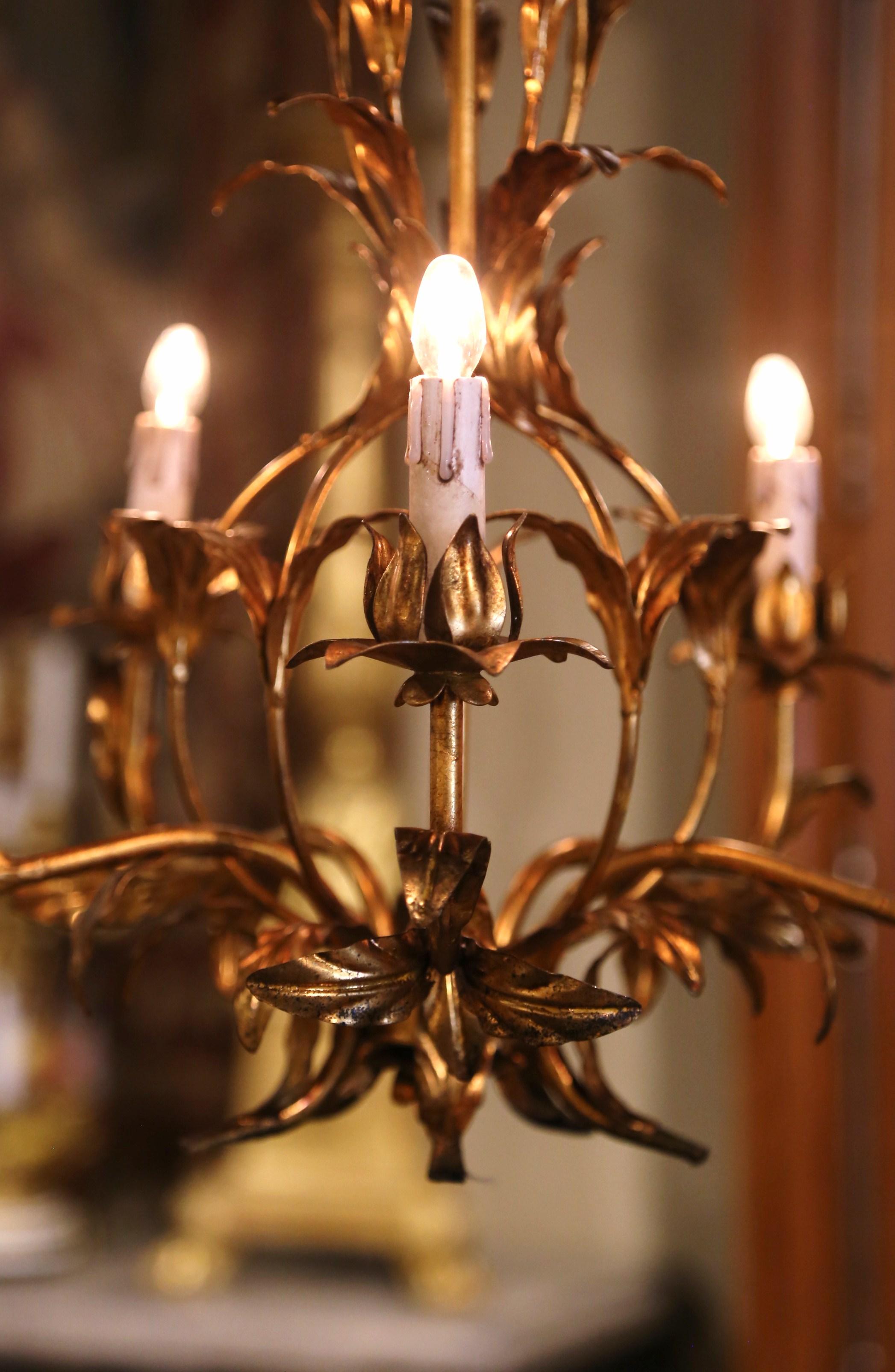 20th Century Pair of Mid-Century French Gilt Metal Six-Light Chandeliers with Leaf Motifs