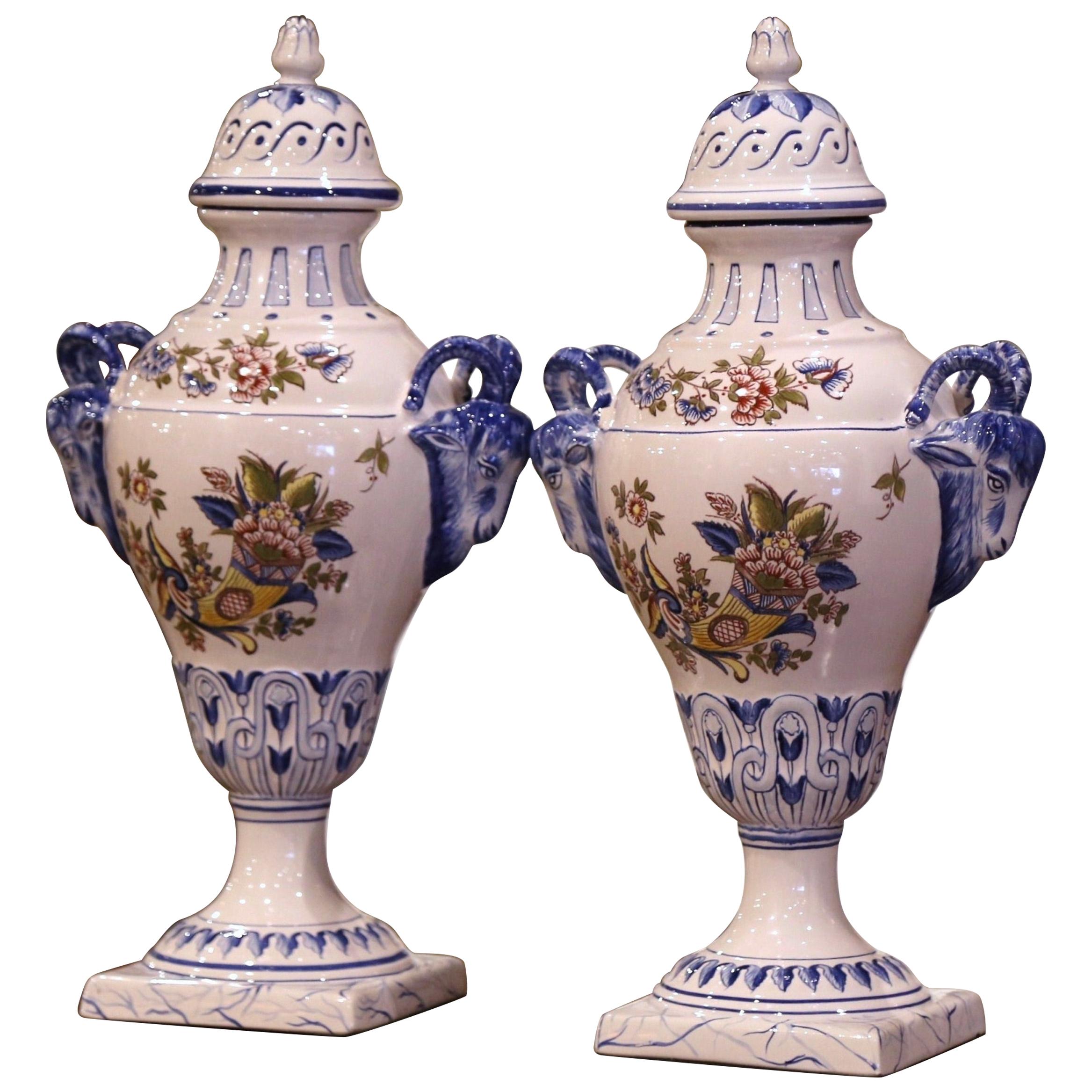Pair of Mid-Century French Hand Painted Faience "Saint Clement" Urns with Lids