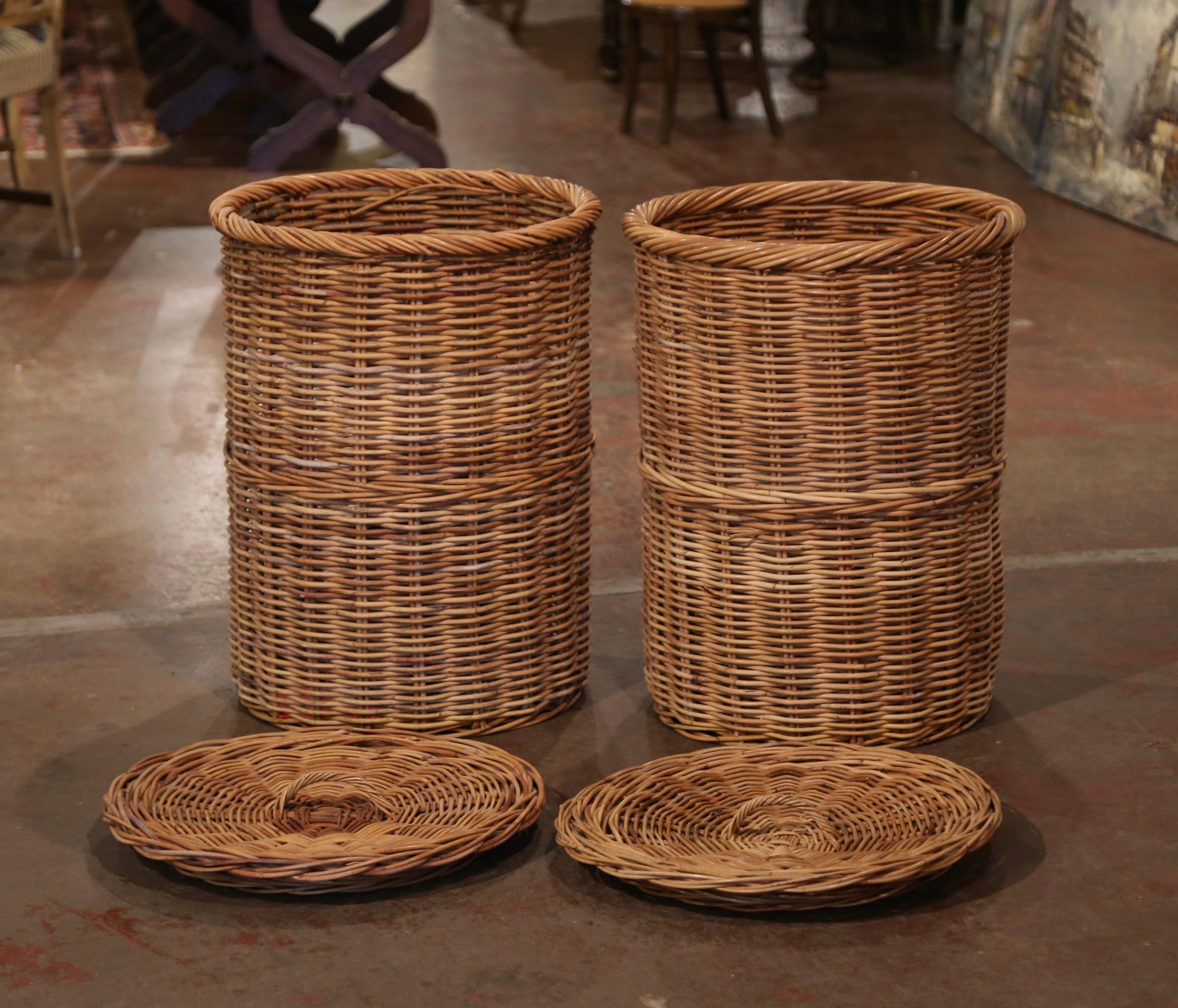 Put some Country French style in your closet or your storage situation with these big antique baskets. Created in France circa 1950, these classic baskets are round in shape and make of handwoven wicker. The baskets are in excellent condition and