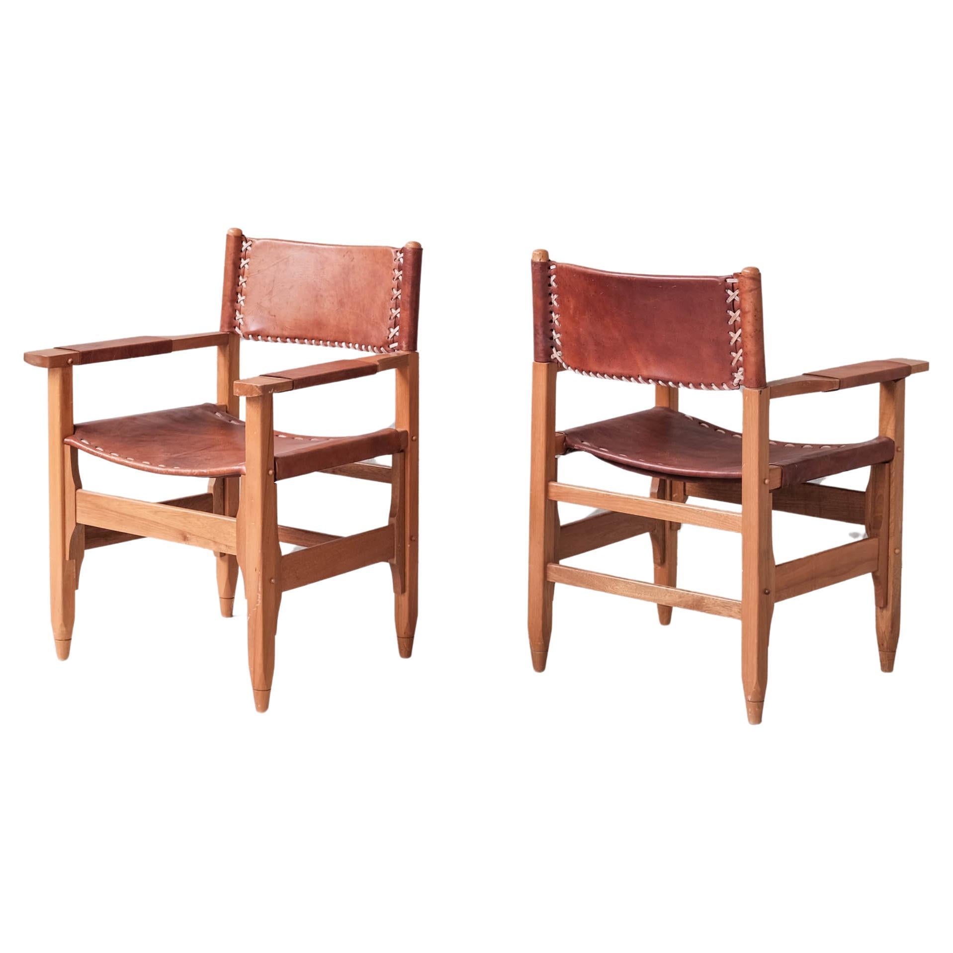 Pair of Mid-Century French Leather Armchairs For Sale