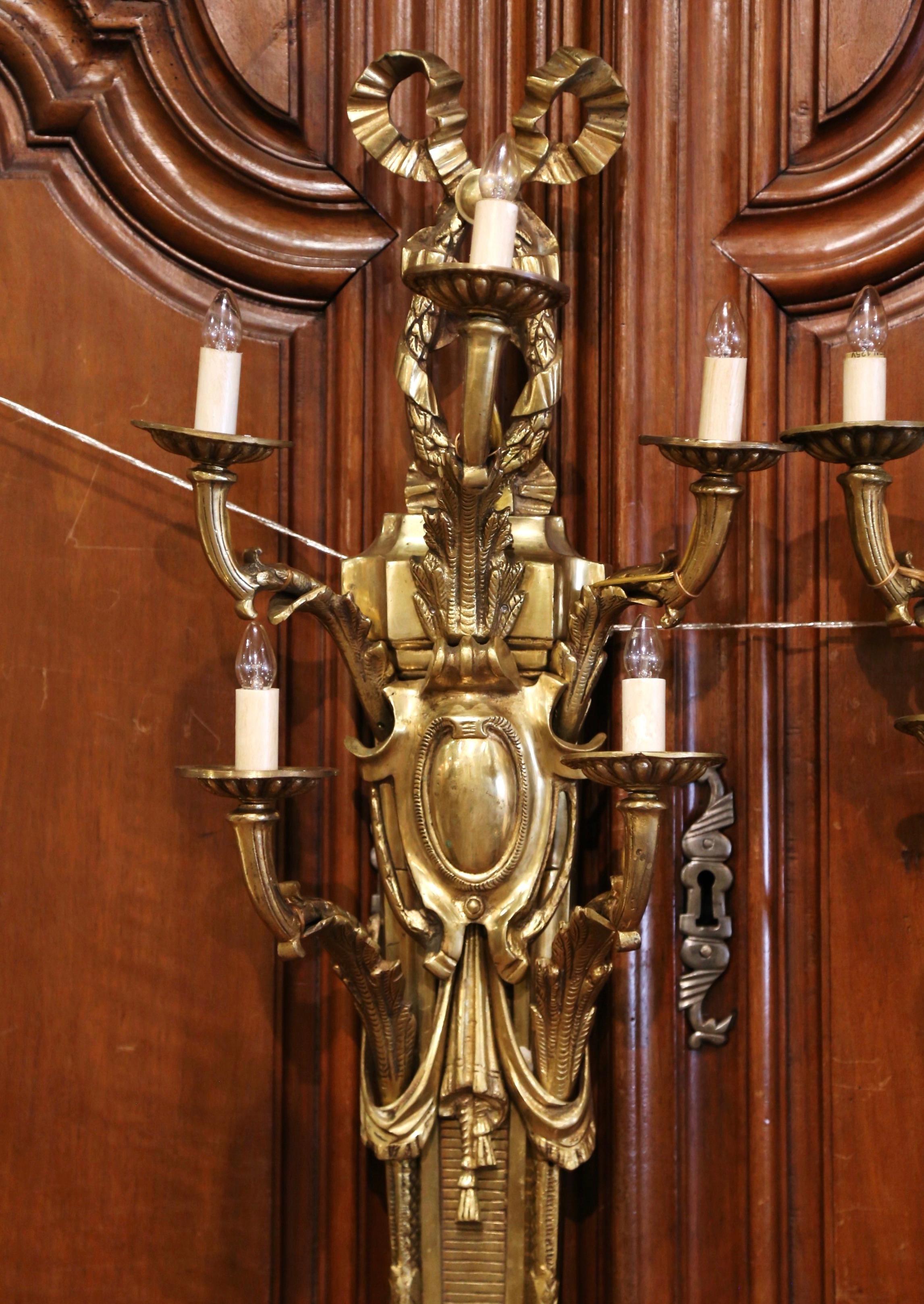 Pair of Mid-Century French Louis XVI Bronze Dore Five-Light Wall Sconces In Excellent Condition In Dallas, TX
