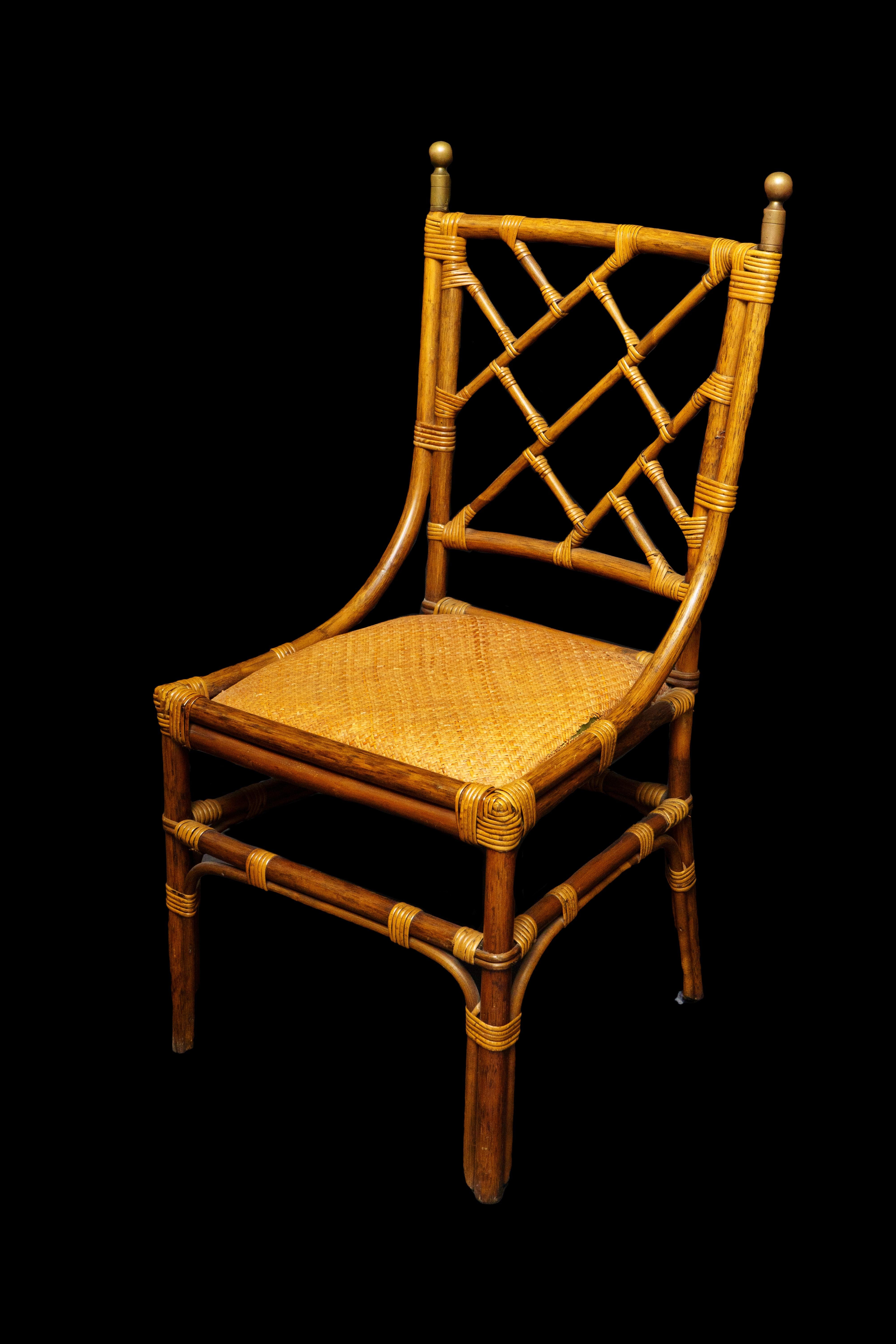 Pair of Mid Century French Rattan Brass Side Chairs:

Measures: 19
