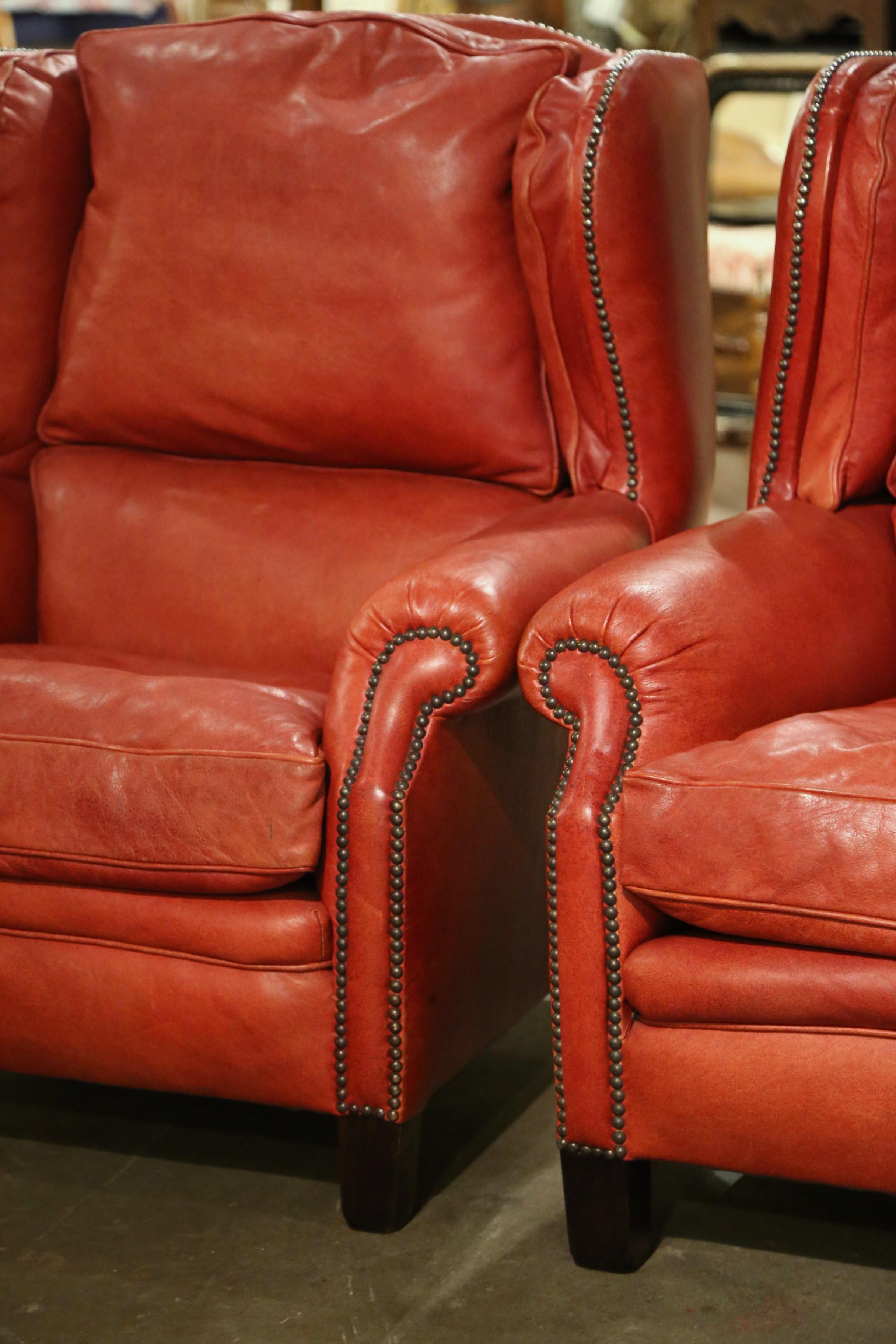 Hand-Crafted Pair of Mid-Century French Red Leather Wing Back Club Armchairs with Nail Heads For Sale
