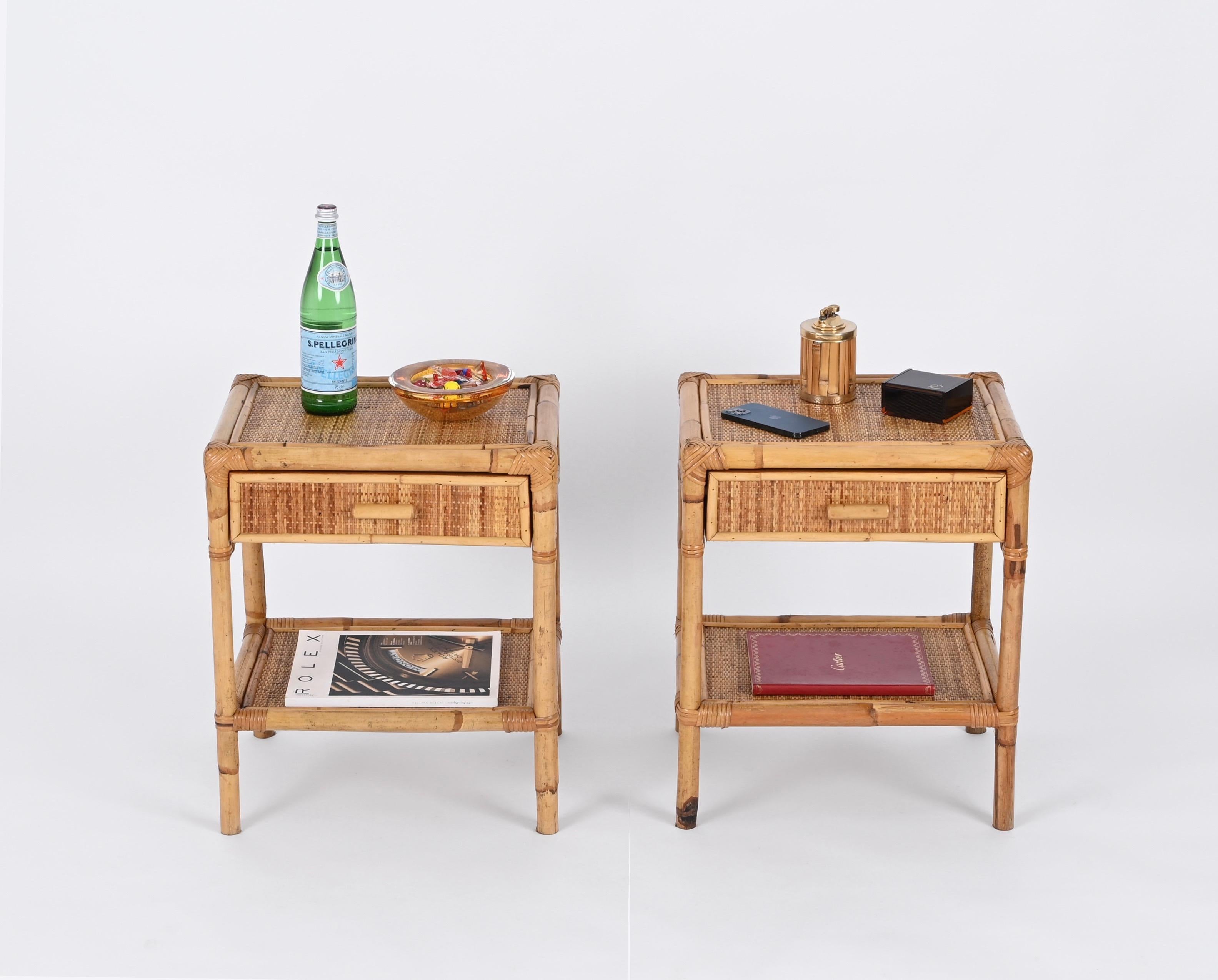 Gorgeous pair of Mid-Century nightstands in bamboo and woven rattan. These lovely bedside tables were designed in Italy during the 1970s.

These nightstands are fully made in bamboo canes and enriched all around by stunning woven rattan.  The