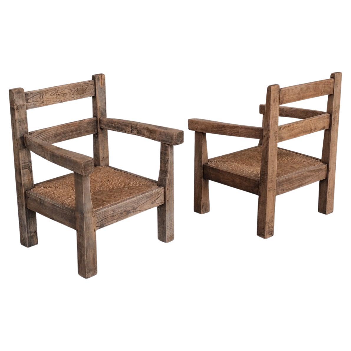 Pair of Mid-Century French Rush Primitive Oak Armchairs For Sale