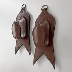 Pair of Mid Century French Saddle Leather Wall Coat Hooks in the style of Adnet