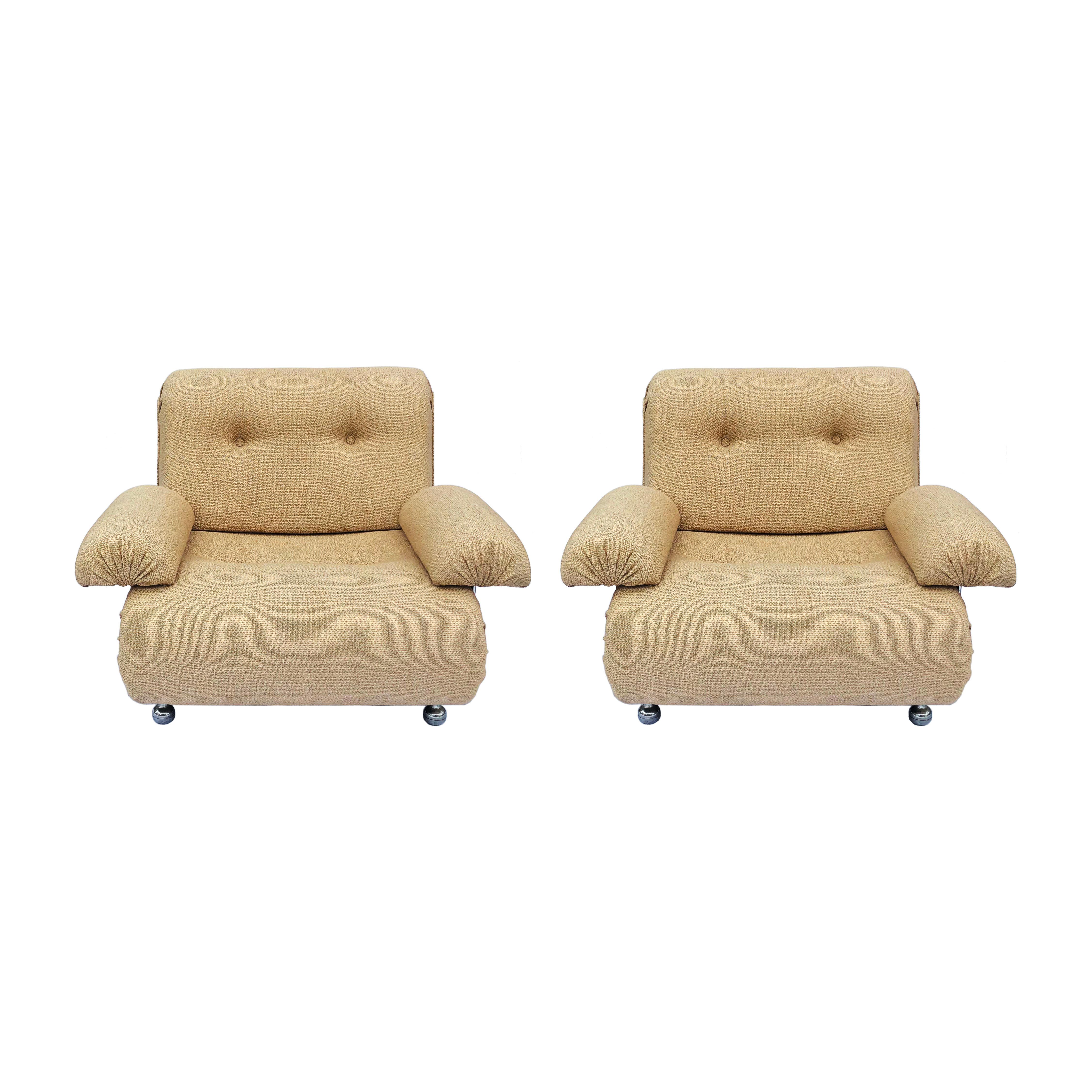 Pair of G-plan modular low armchairs with original beige/brown upholstery and chrome frame. The body looks like one long foam that folds and creates a seat, the foam stays in place with the buttons. Very comfortable armchairs with wide removable
