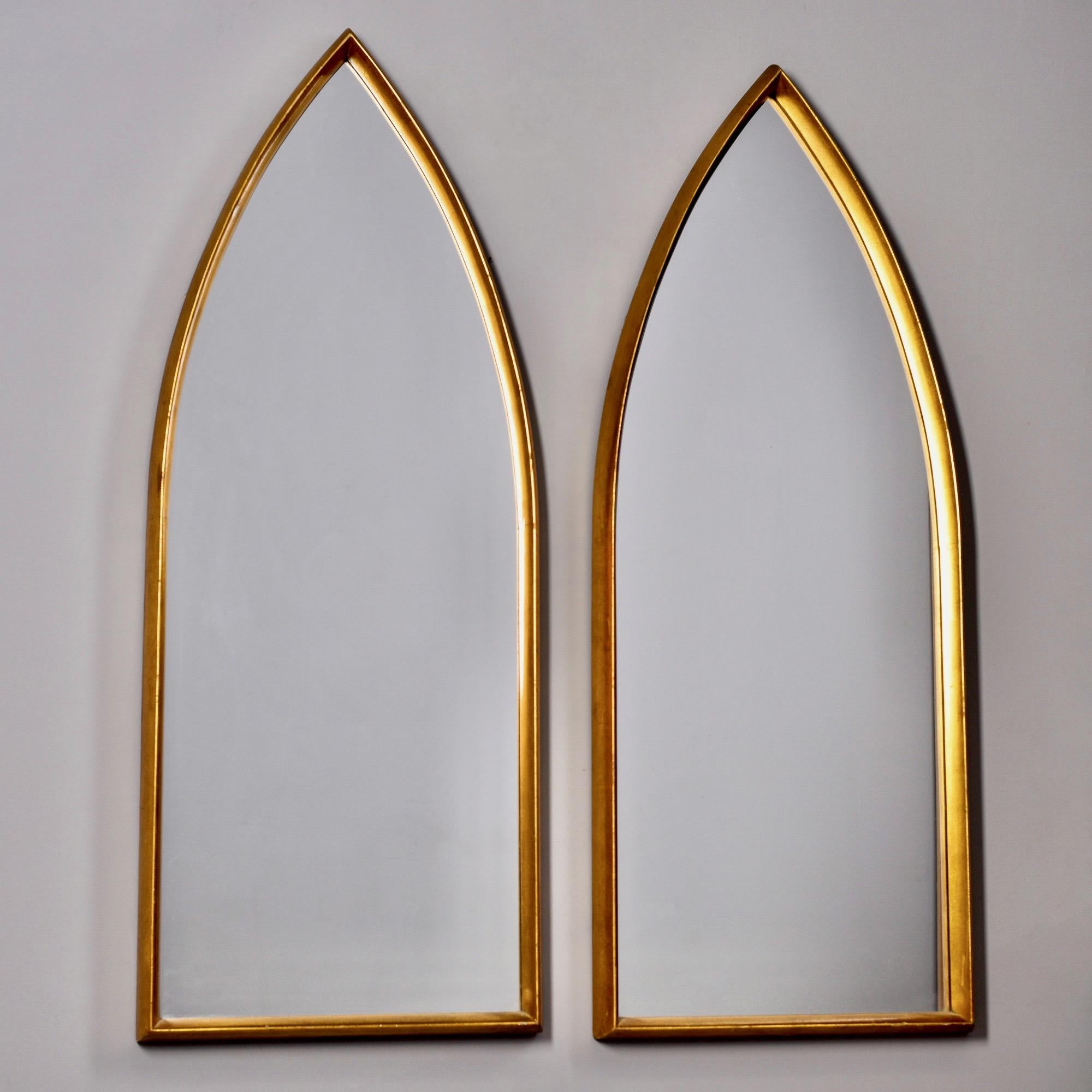 Found in the US, this pair of giltwood cathedral style mirrors are mounted in deep set frames. Unknown maker. Frames have some scattered surface wear and nicks but are in overall very good vintage condition. Sold and priced as a pair. 

Actual