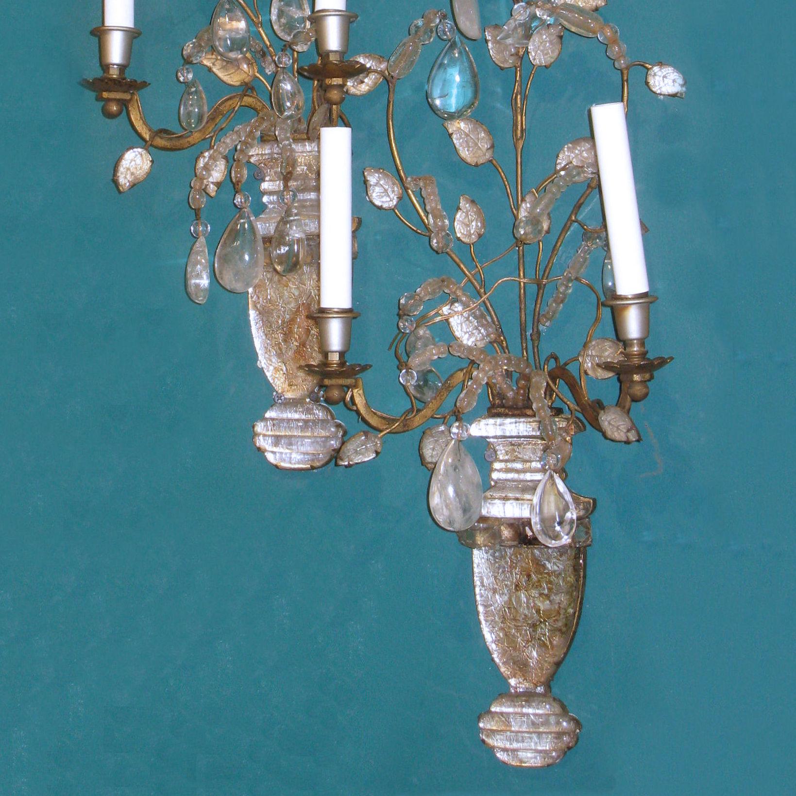 Pair of midcentury glass, rock crystal and gilt metal sconces attributed to Baguès.