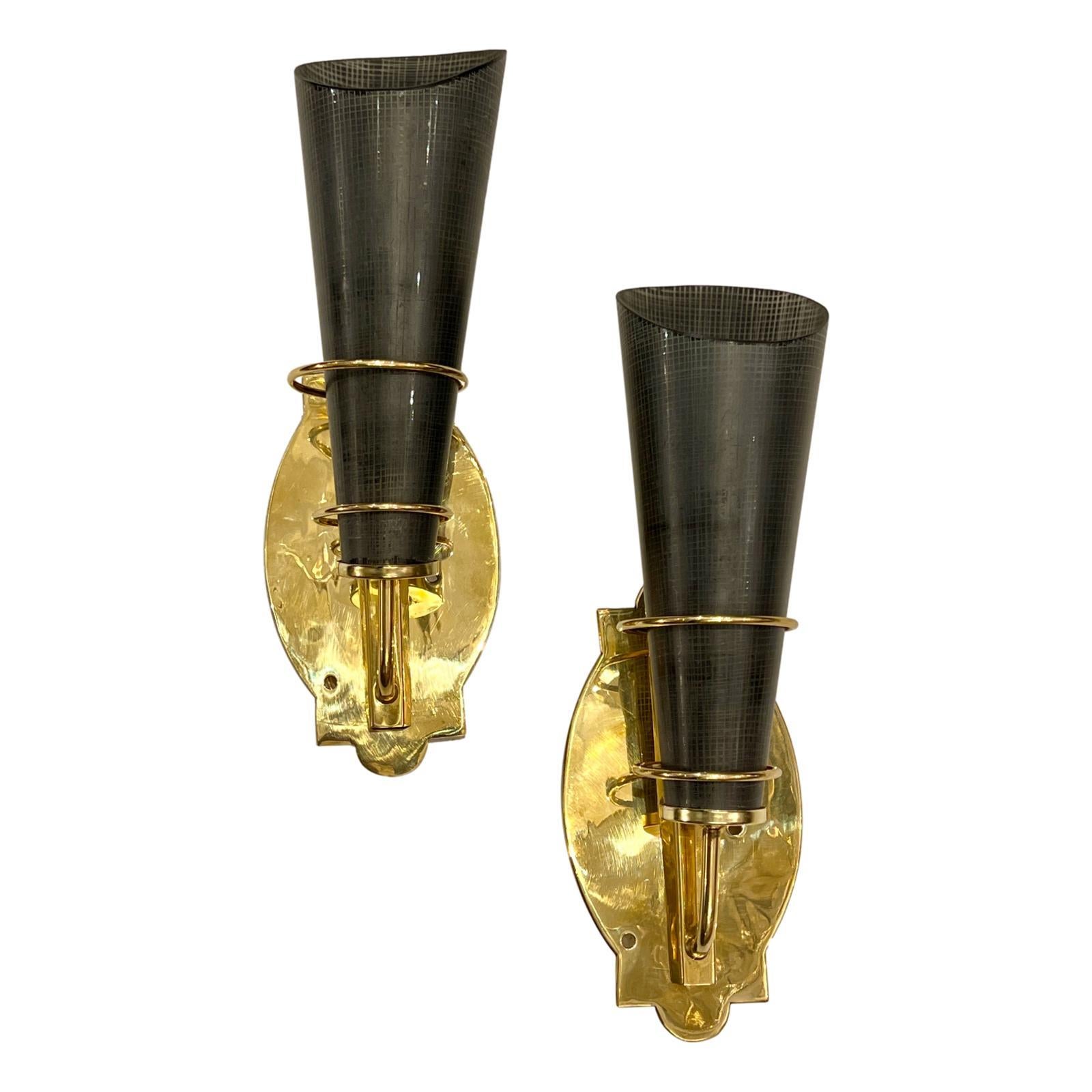 Pair of Italian circa 1950's polished bronze sconces with molded glass shades.

Measurements:
Height: 14