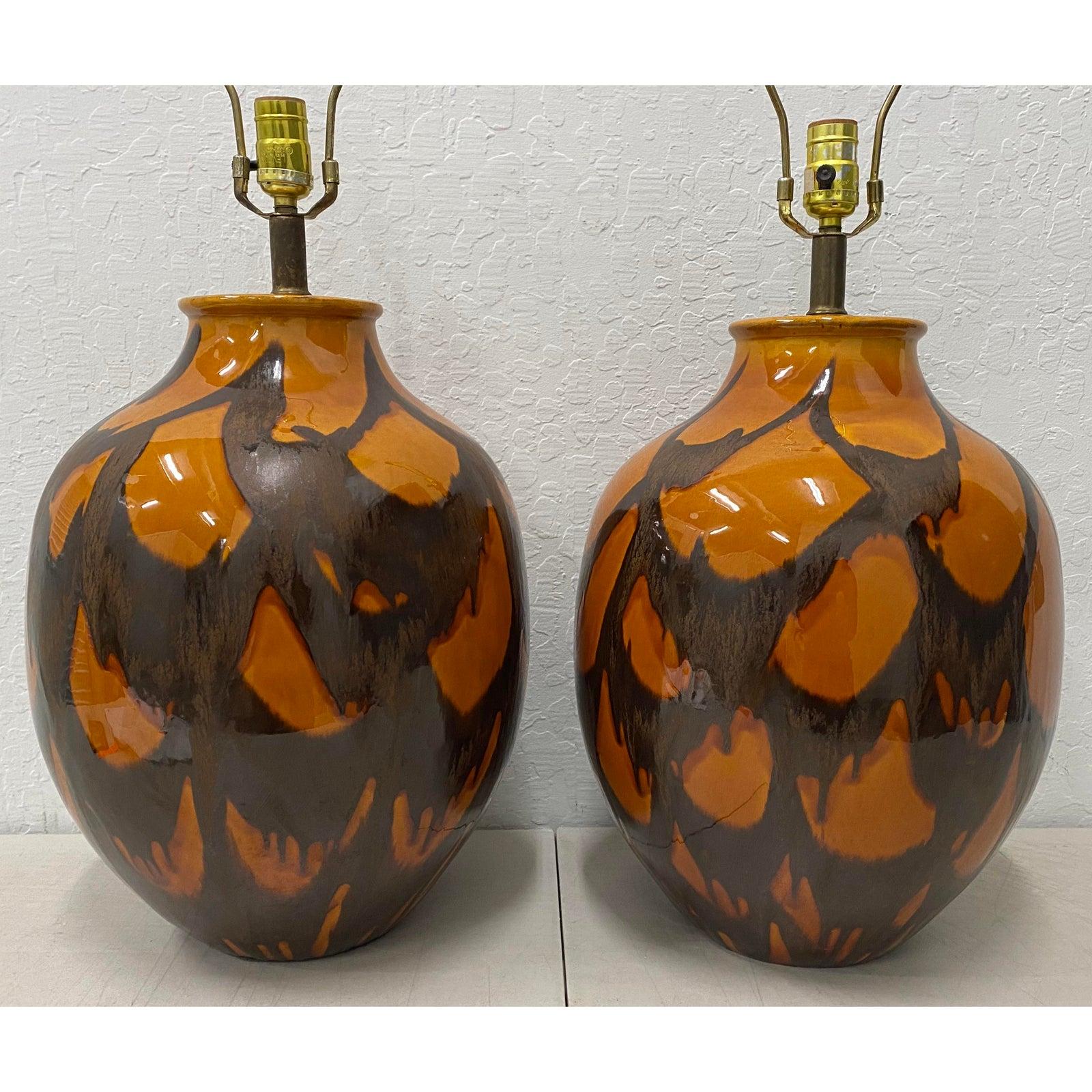 Pair of midcentury glazed ceramic lamps, circa 1970s

Orange and brown glazes - Large Bulbous shape

Measures: 13