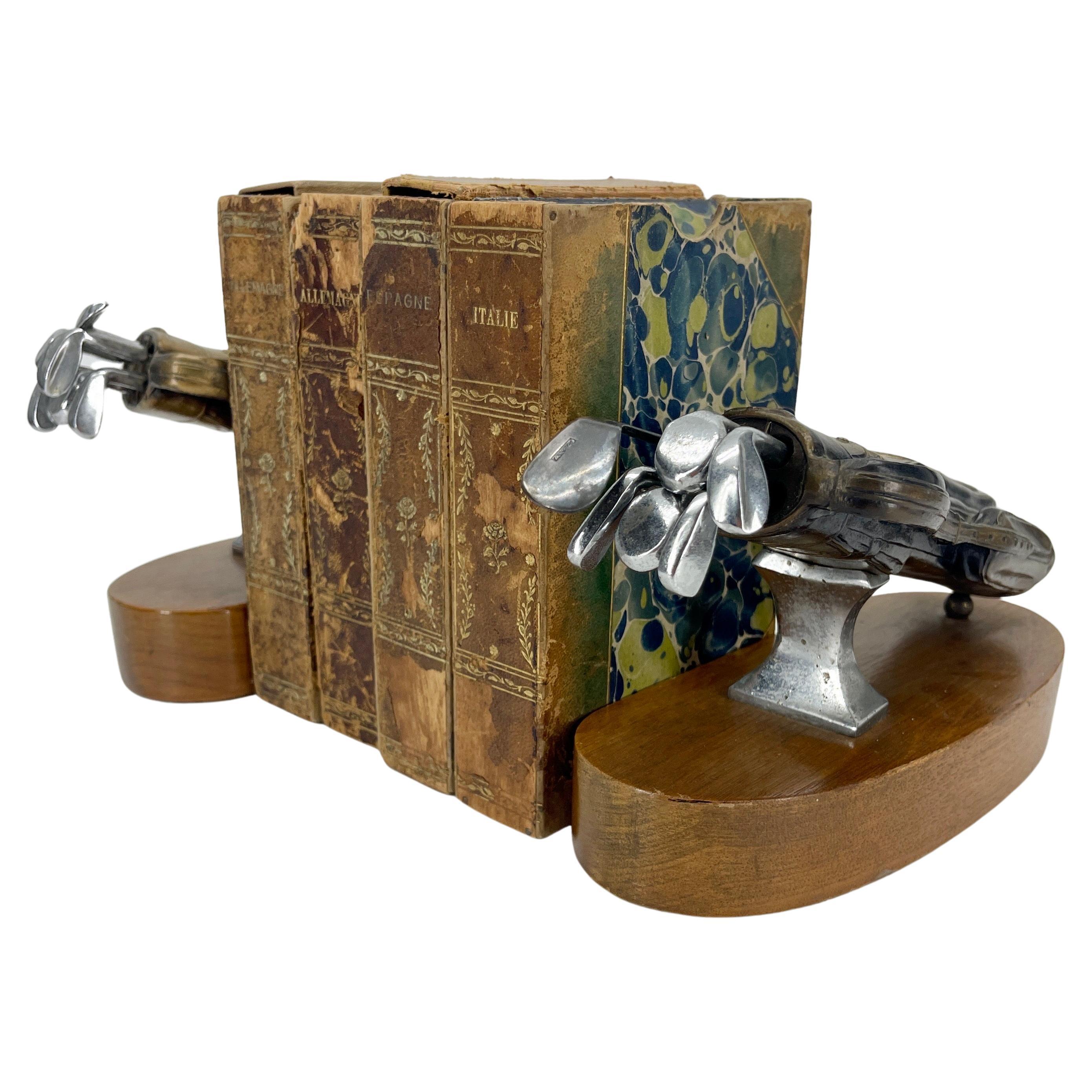 Brass Golf Bag Themed Bookends on wooden stand. 
All the clubs comes out.