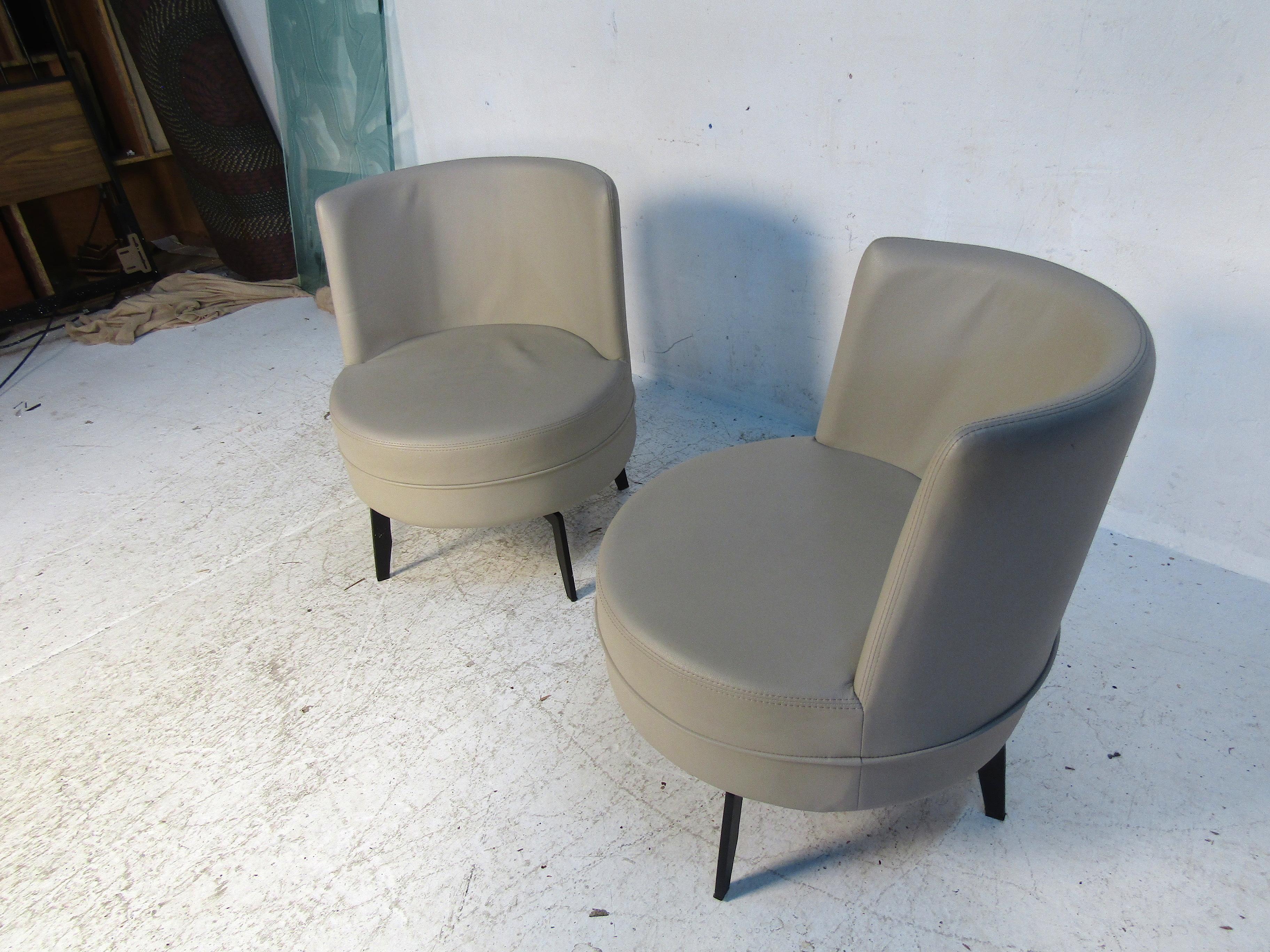 20th Century Pair of Midcentury Grey Leather Swivel Chairs