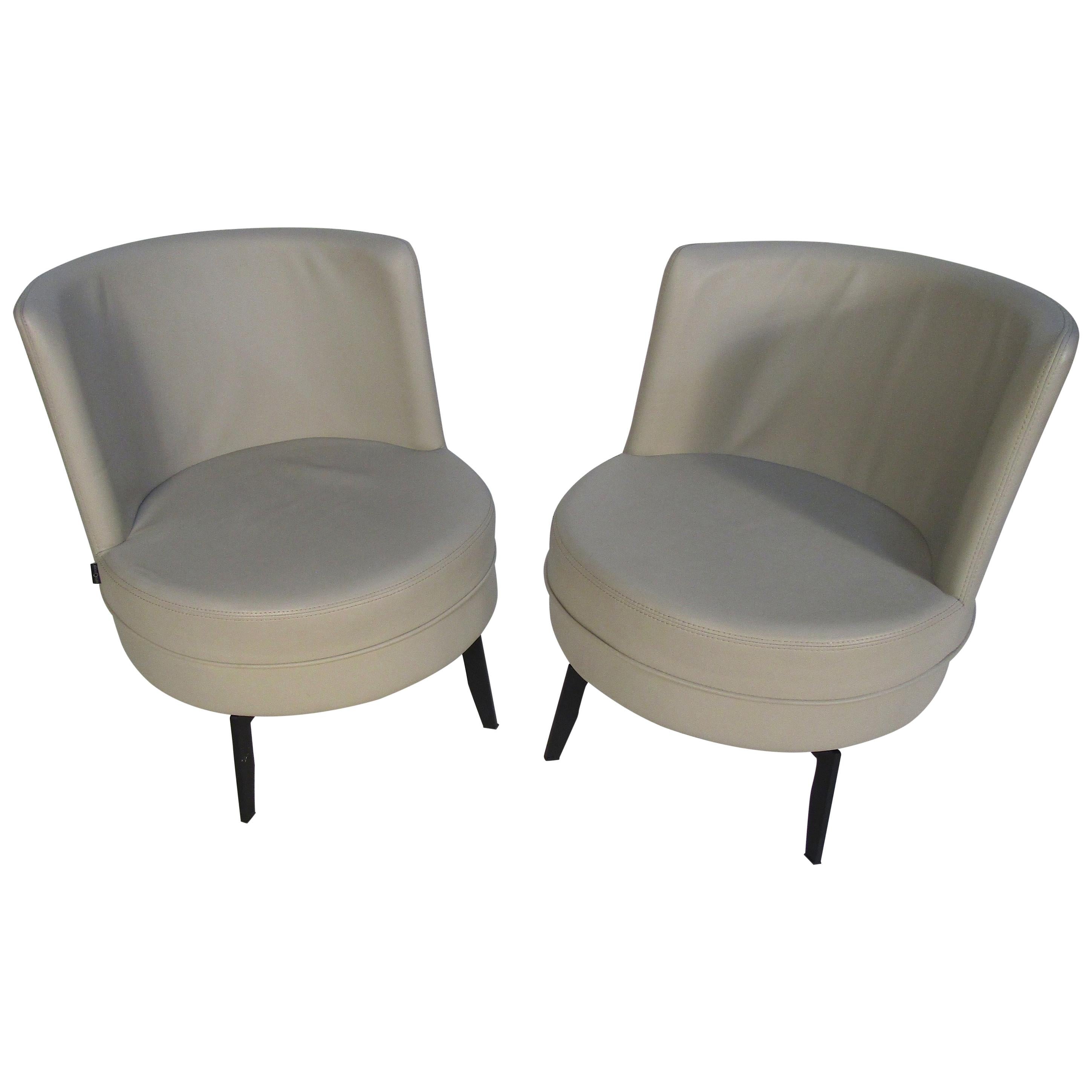 Pair of Midcentury Grey Leather Swivel Chairs