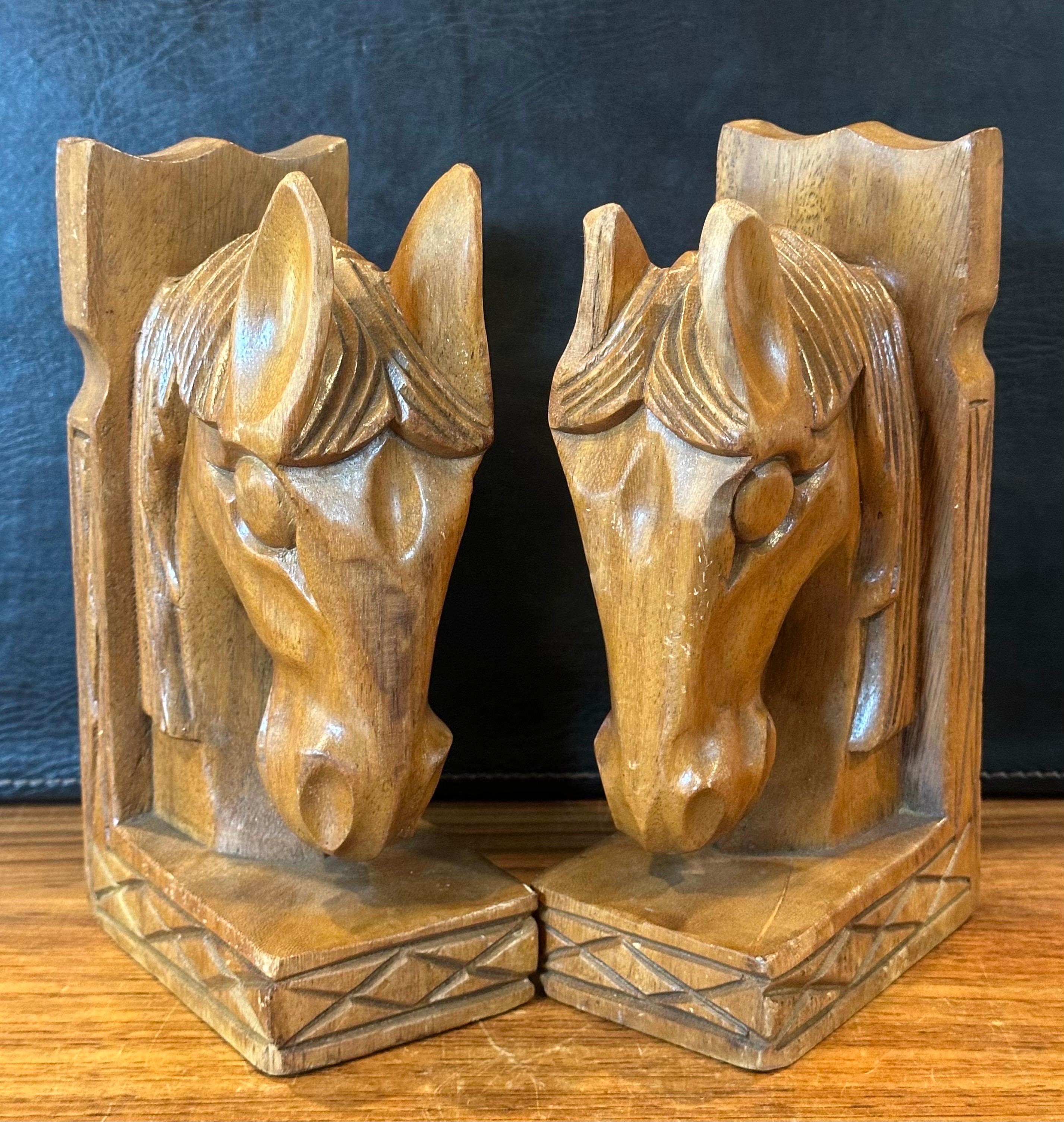 Pair of Mid-Century Hand Carved Wood Horse Head Bookends In Good Condition For Sale In San Diego, CA