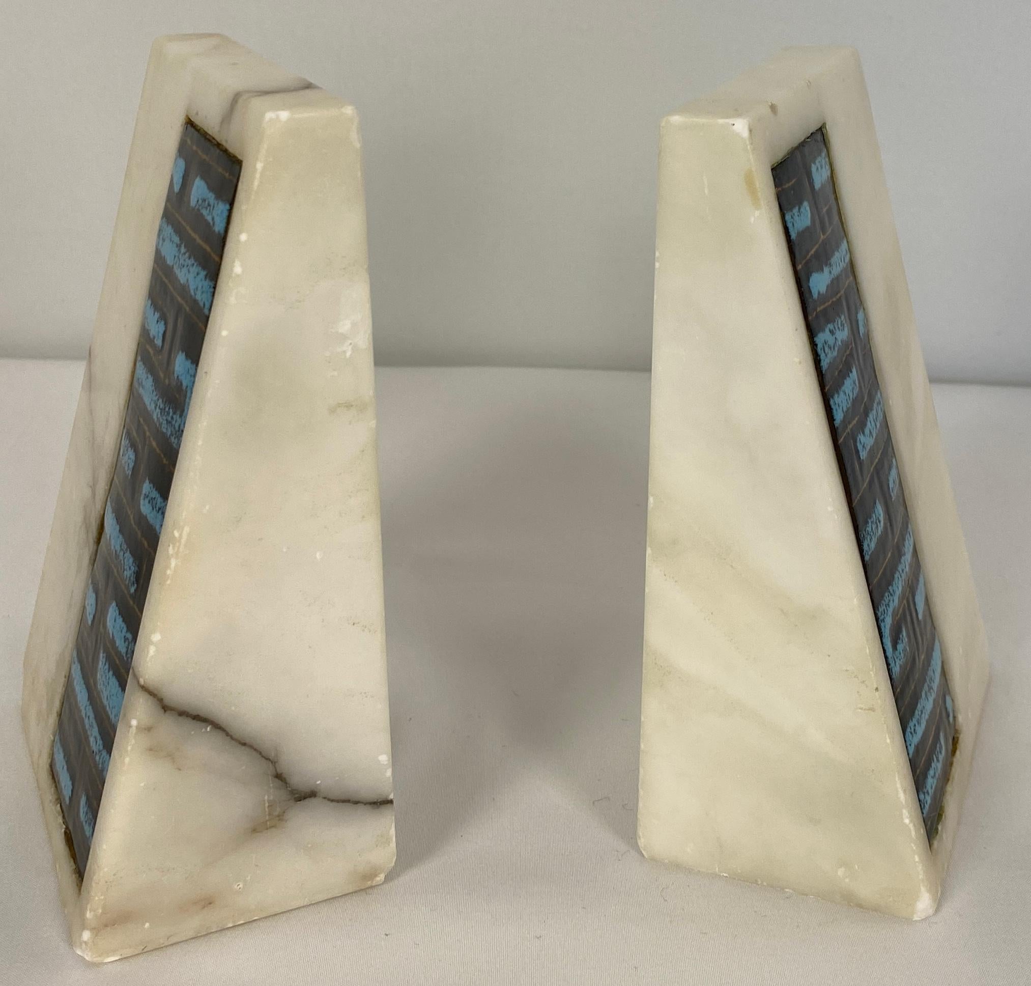 Vintage pair of abstract marble and ceramic bookends. 
This interesting design is attributed to Fratelli Mannelli and was manufactured by Raymor. 

These stylish pair of abstract marble and ceramic bookends will look wonderful on any shelf while