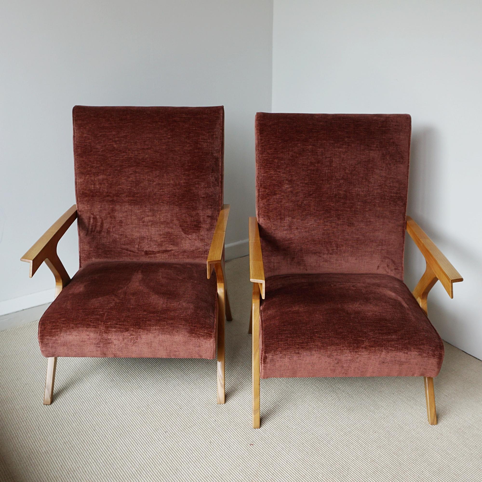 A pair of mid-century armchairs attributed to Antonio Gorgone. Solid Elm angular frame with a brick red frabric re-upholstery. 

Dimensions: H 95cm W 65cm D 68cm Seat H 36cm W 57cm D 52cm

Origin: Italian

Date: Circa 1950

Item Number: 2604242

All
