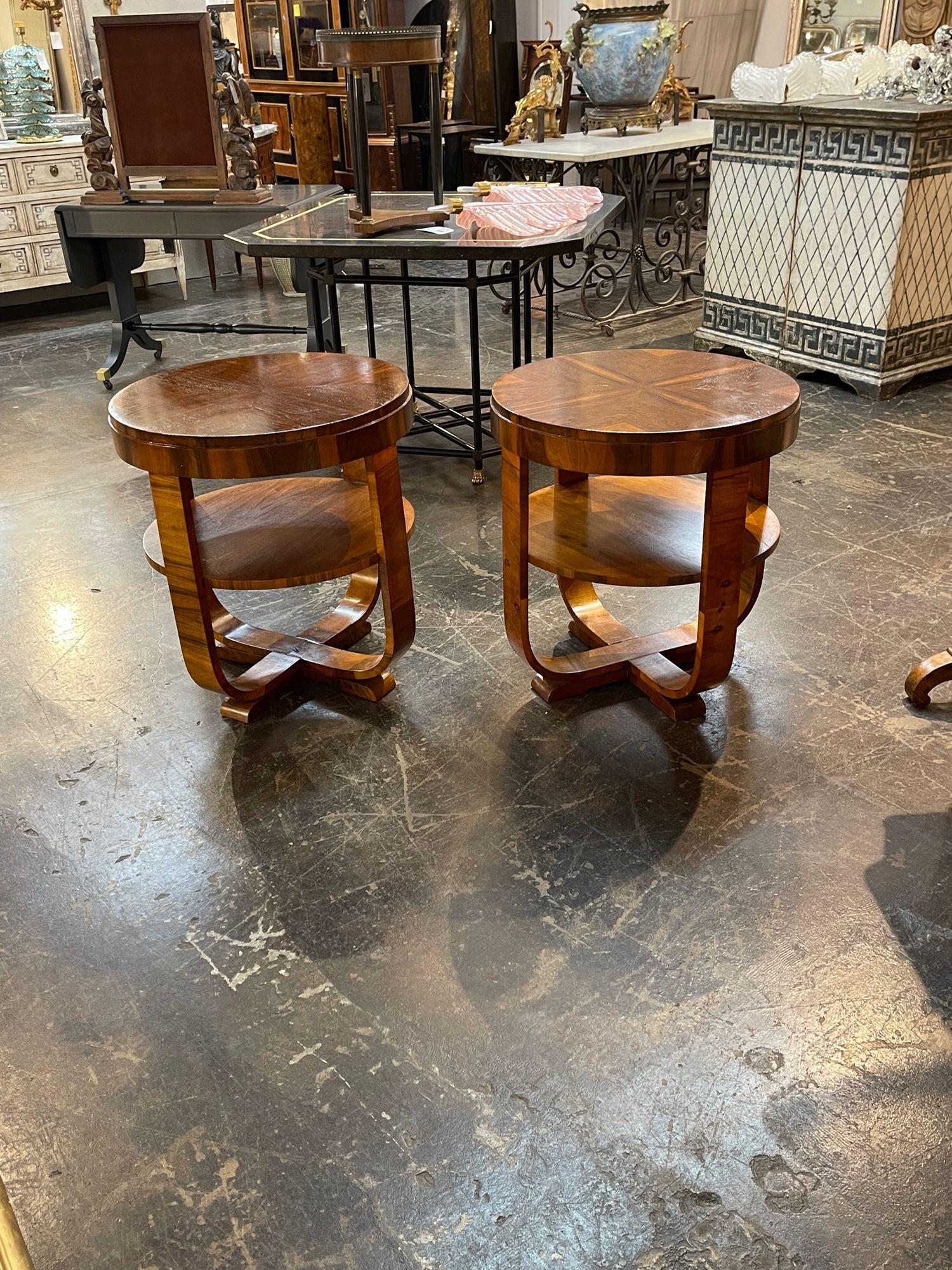 Gorgeous pair of mid-century Italian Art Deco walnut side tables. Beautiful polished finish on these and they mix well with a variety of decors. Lovely!