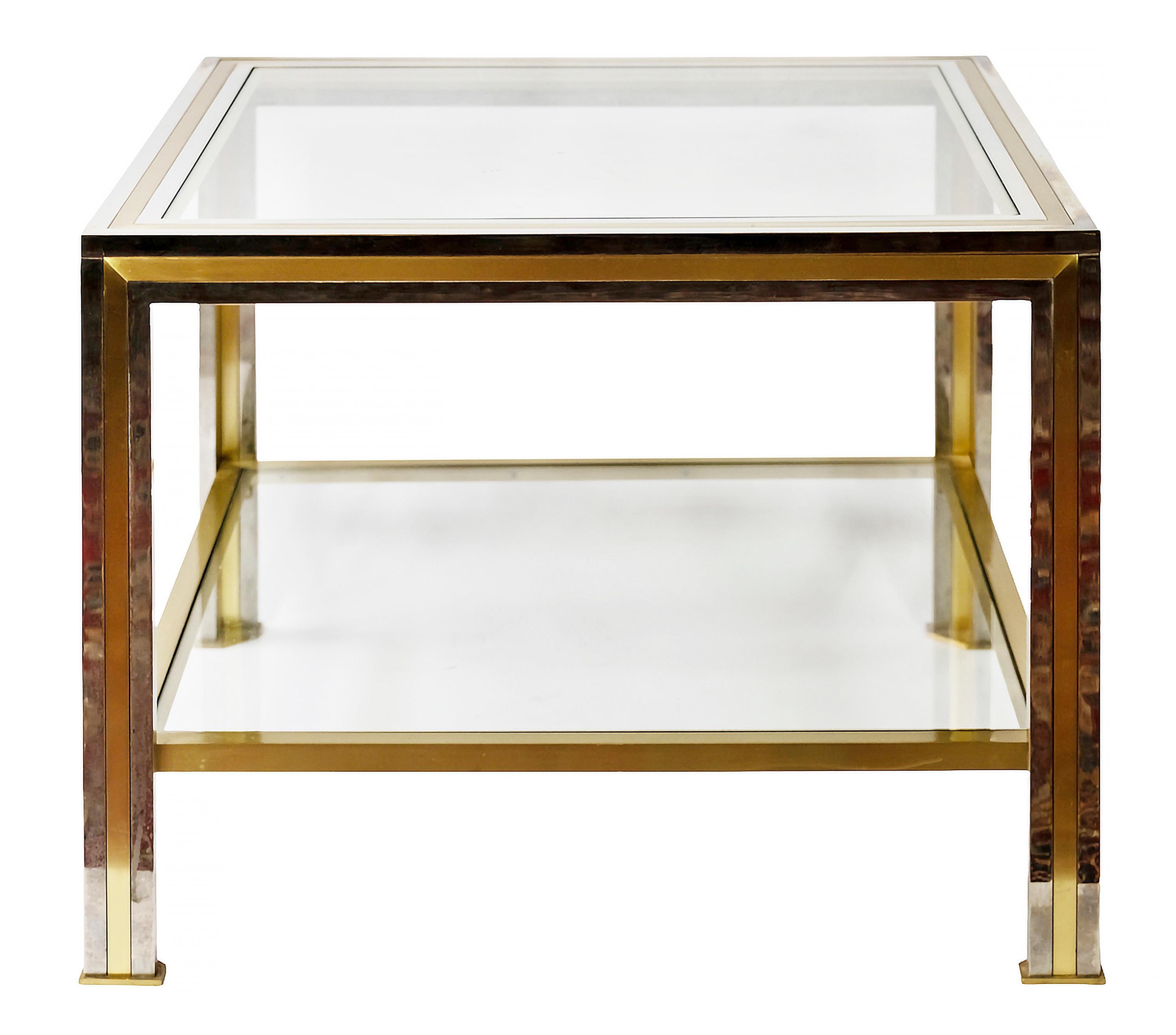 This pair of mid-century Italian side tables made of brass and chrome frame with transparent glass.
Heavy and solid, very good condition.