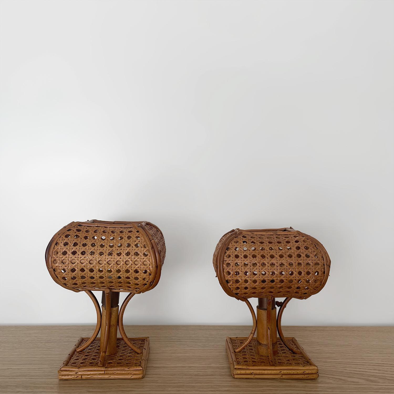 Italian cane & rattan table lamps
Italy, mid century
Handcrafted artisanal piece
Each lamp is unique in its composition but still works well as part of a pair
Beautifully sculpted rattan & cane dome shades 
Single bamboo reed is supported by smaller