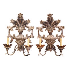 Pair of Mid-Century Italian Carved and Iron Silver Leaf Wall Sconces