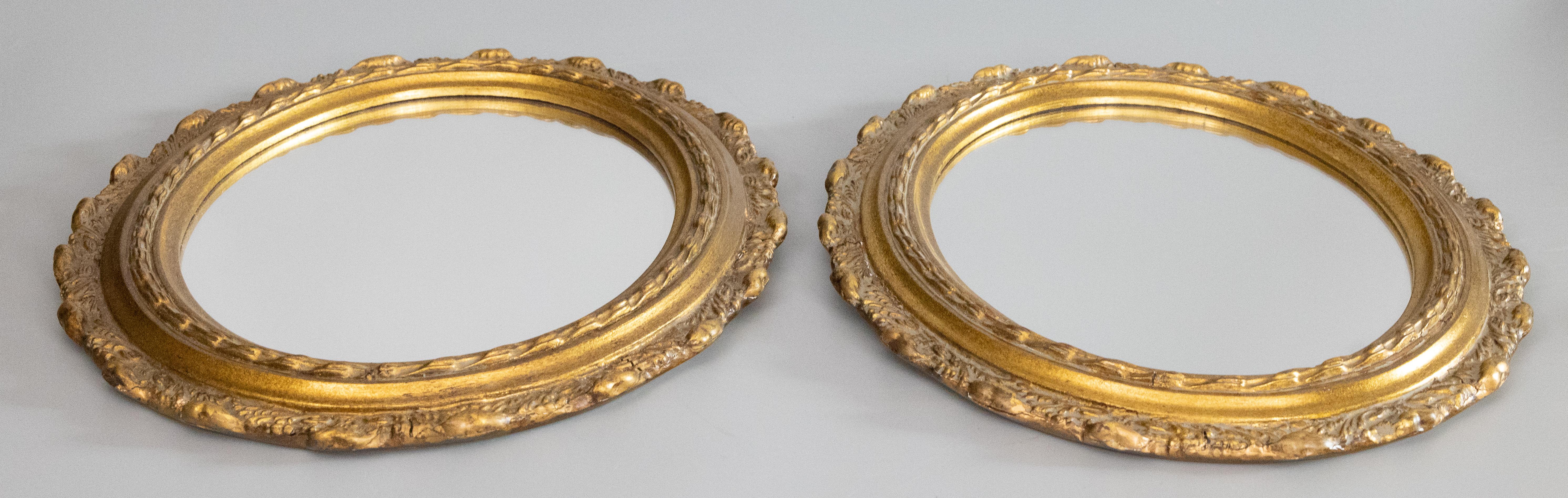 20th Century Pair of Mid-Century Italian Giltwood and Gesso Oval Mirrors, circa 1950 For Sale