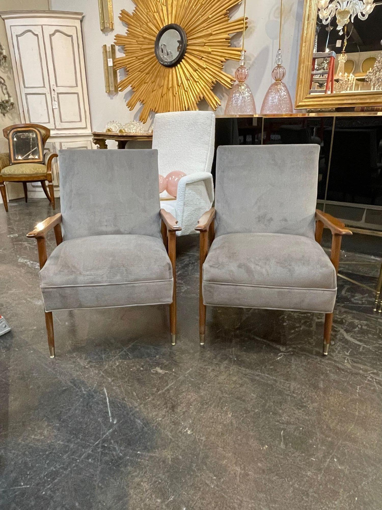 Handsome pair of mid-century Italian walnut Gio Ponti style armchairs. Circa 1960. A fine addition to any home!
