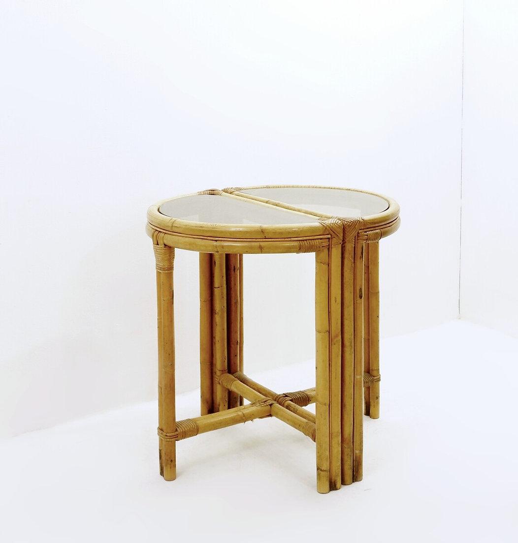 Wear consistent with age and use
Pair of mid-century italian half-moon bamboo and smoked glass console tables
Pair of console tables
Measures : 71cmx39cm H:75cm 
Materials : Bamboo - Smoked Glass top 

