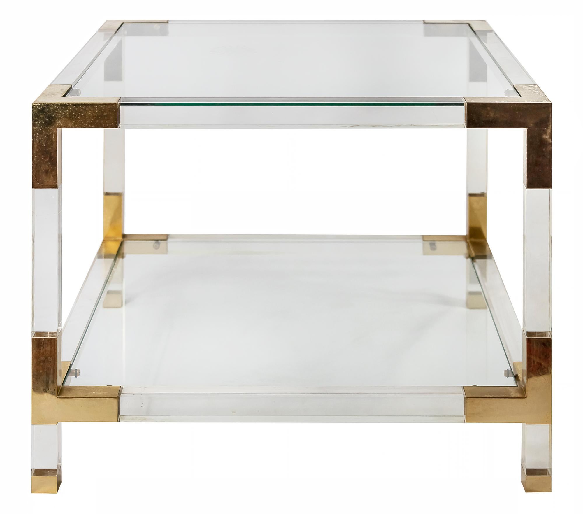 Pair of mid-century Italian side/sofa tables in plexiglass and gilded metal with glass top and lower shelve.
Lebel: Sciolari Roma.
 