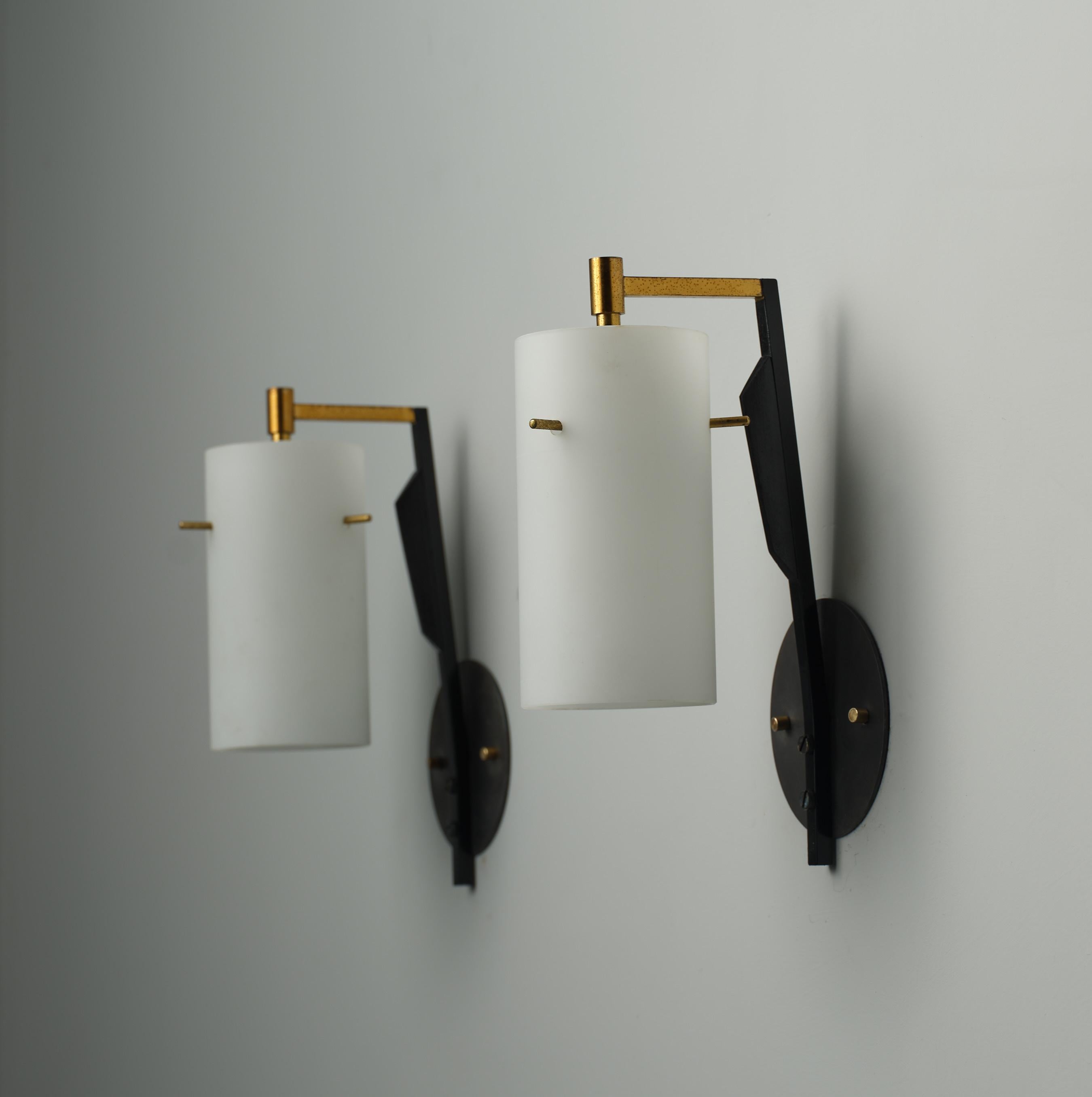 Metal Pair of Mid-Century Italian Sconces in Brass and Black with Opaline Glass Shades For Sale