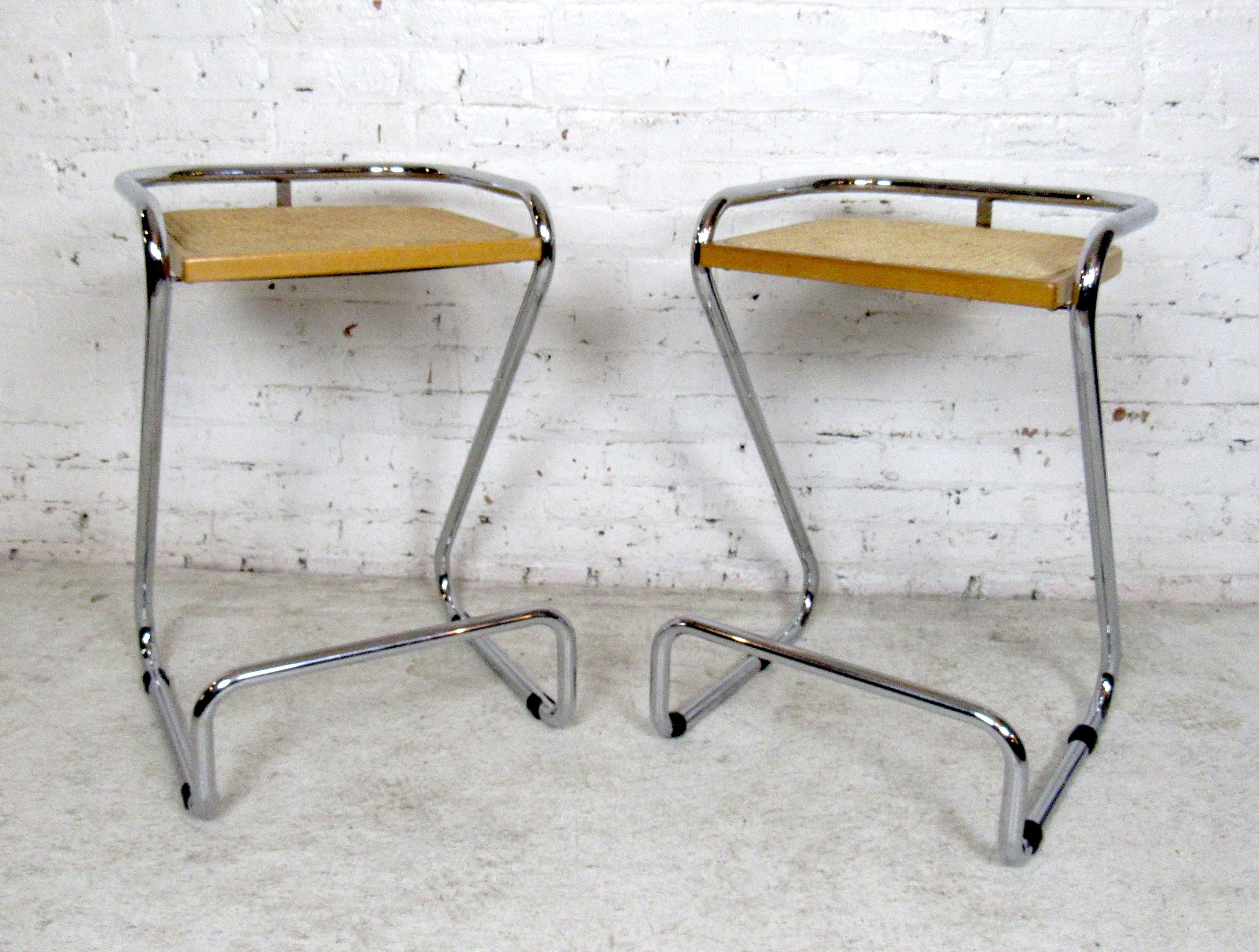 Gorgeous pair of Mid-Century Modern stools featured in a chrome frame and rattan seating, made in Italy. 

(Please confirm item location - NY or NJ - with dealer).