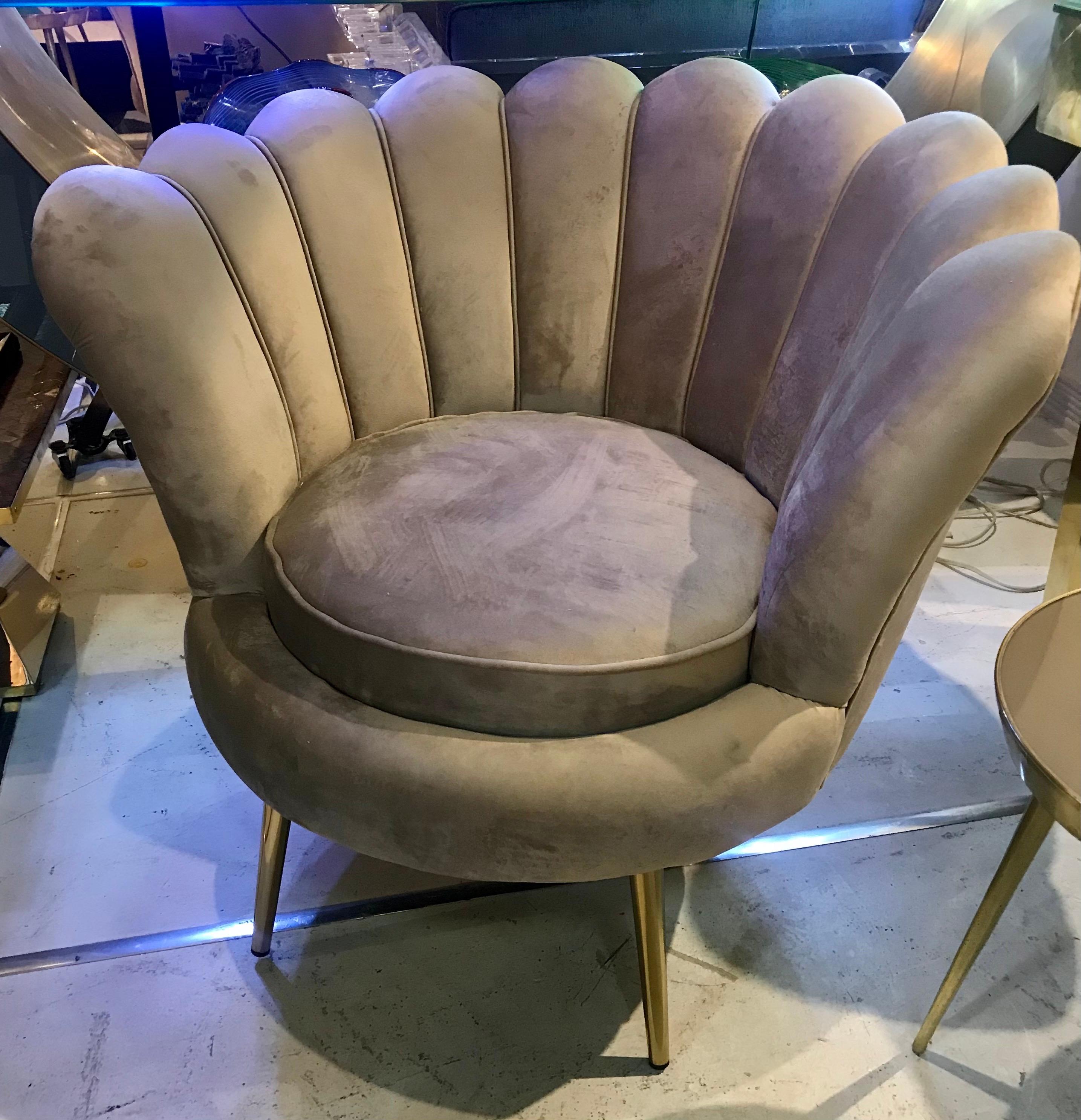 Gorgeous taupe beige velvet fan backed lounge chairs with tapered brass legs. A pair of comfortably beautiful midcentury gems.