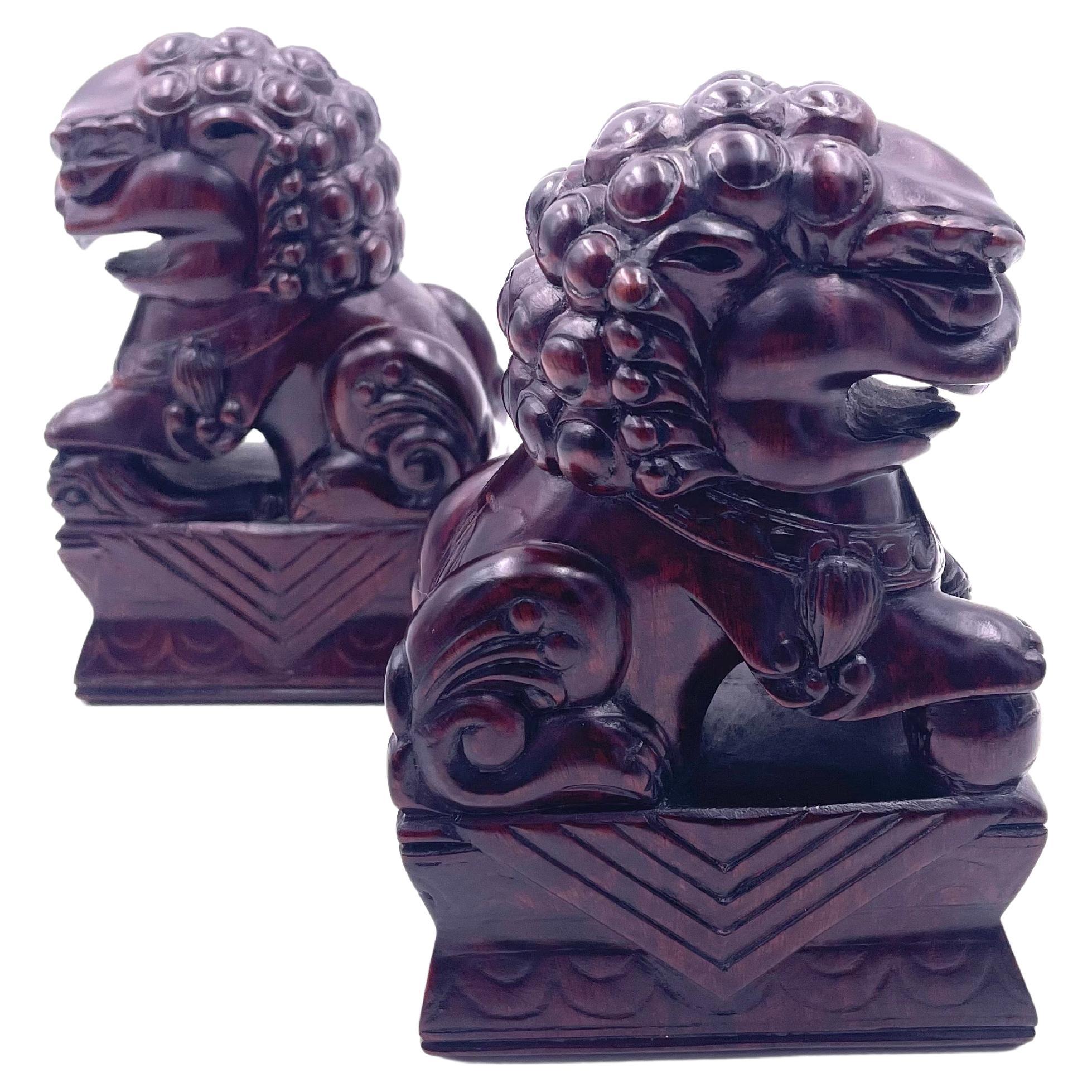 A very nice pair of vintage, rosewood carved foo dogs from Japan. Excellent condition and patina; makes a fun decor item in any room!