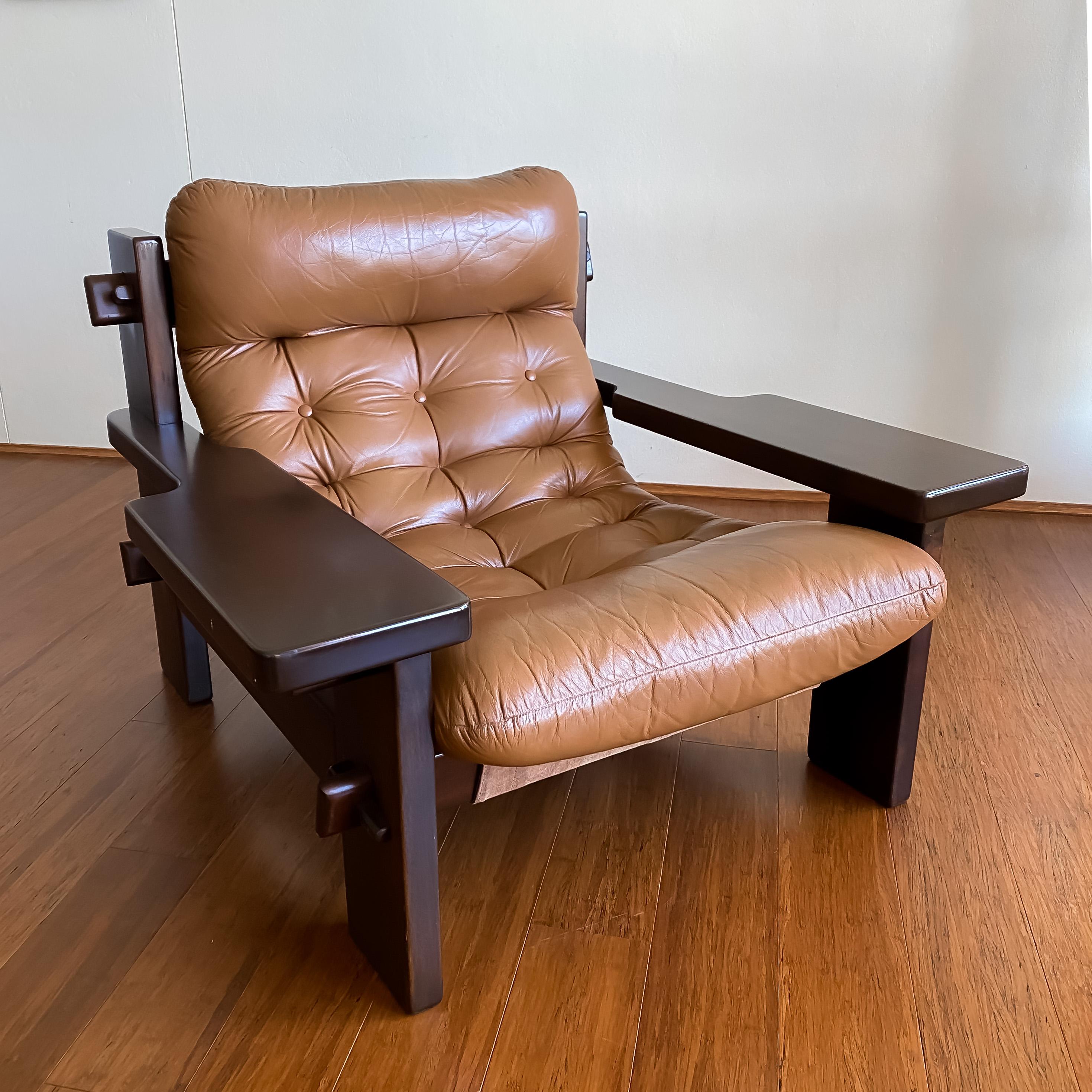 Set of Mid-Century Jean Gillon Large-scale Lounge Armchairs for Probel.

A masterpiece with simple lines and pegged construction creating an elegant and sophisticated look. 

Solid Jacaranda wood frame with leather upholstered cushions. In good
