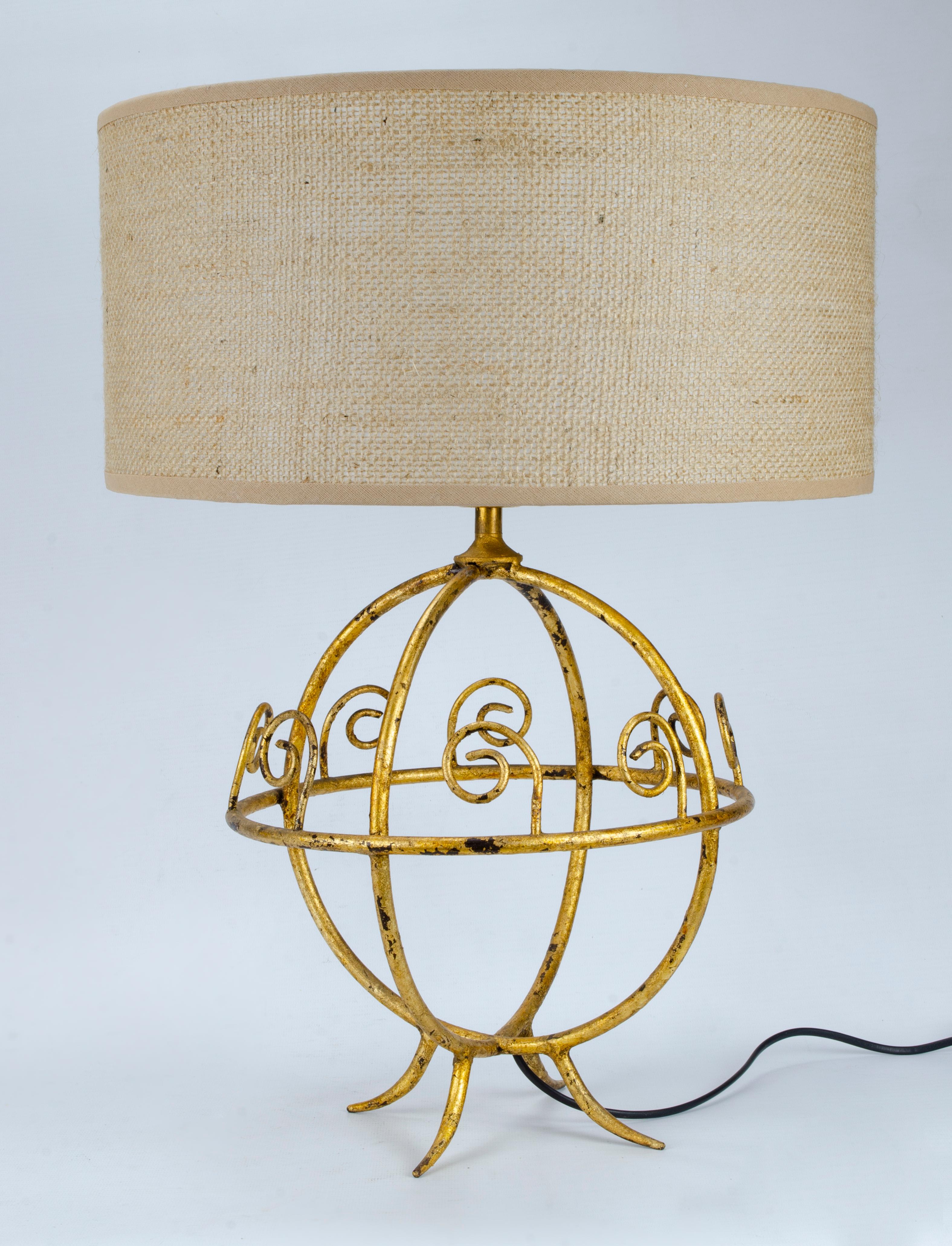 Pair of mid-century lamps
gold leaf technique
The gold has some wear
Possibly originating from Fracia
circa 1940
New burlap screens
electrified 220w.