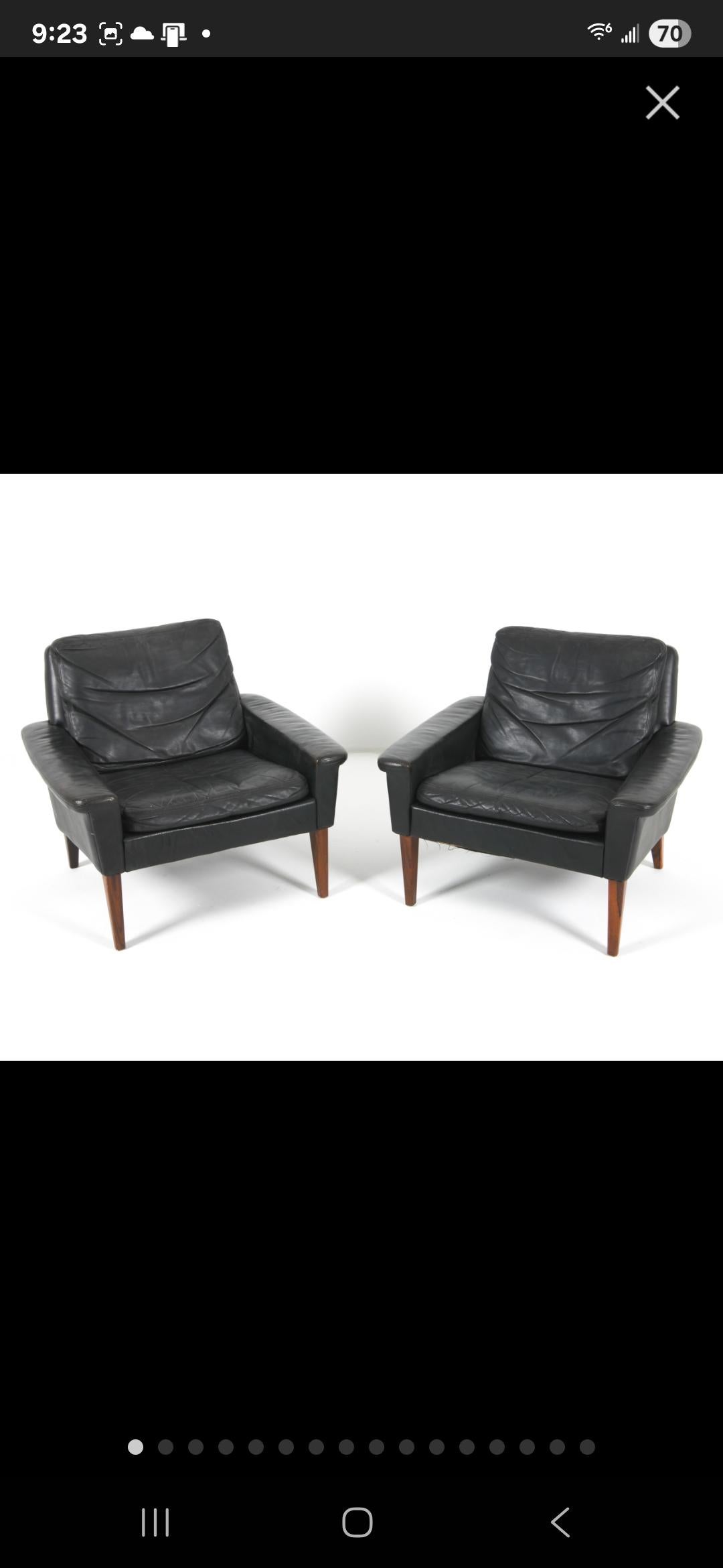 Ein Paar Loungesessel aus Leder und brasilianischem Palisander aus der Mitte des Jahrhunderts (Moderne der Mitte des Jahrhunderts) im Angebot
