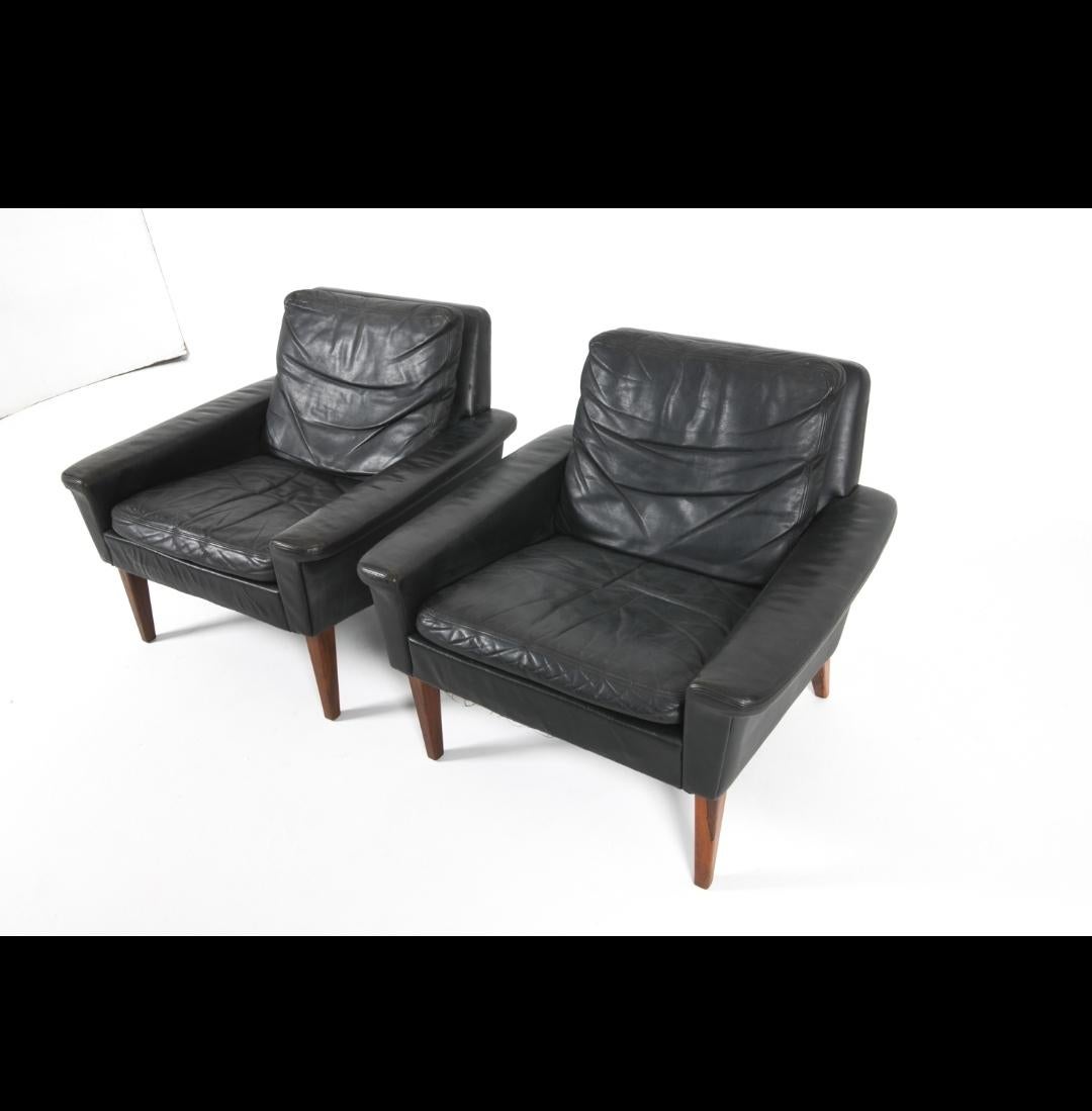 Ein Paar Loungesessel aus Leder und brasilianischem Palisander aus der Mitte des Jahrhunderts (Handgefertigt) im Angebot