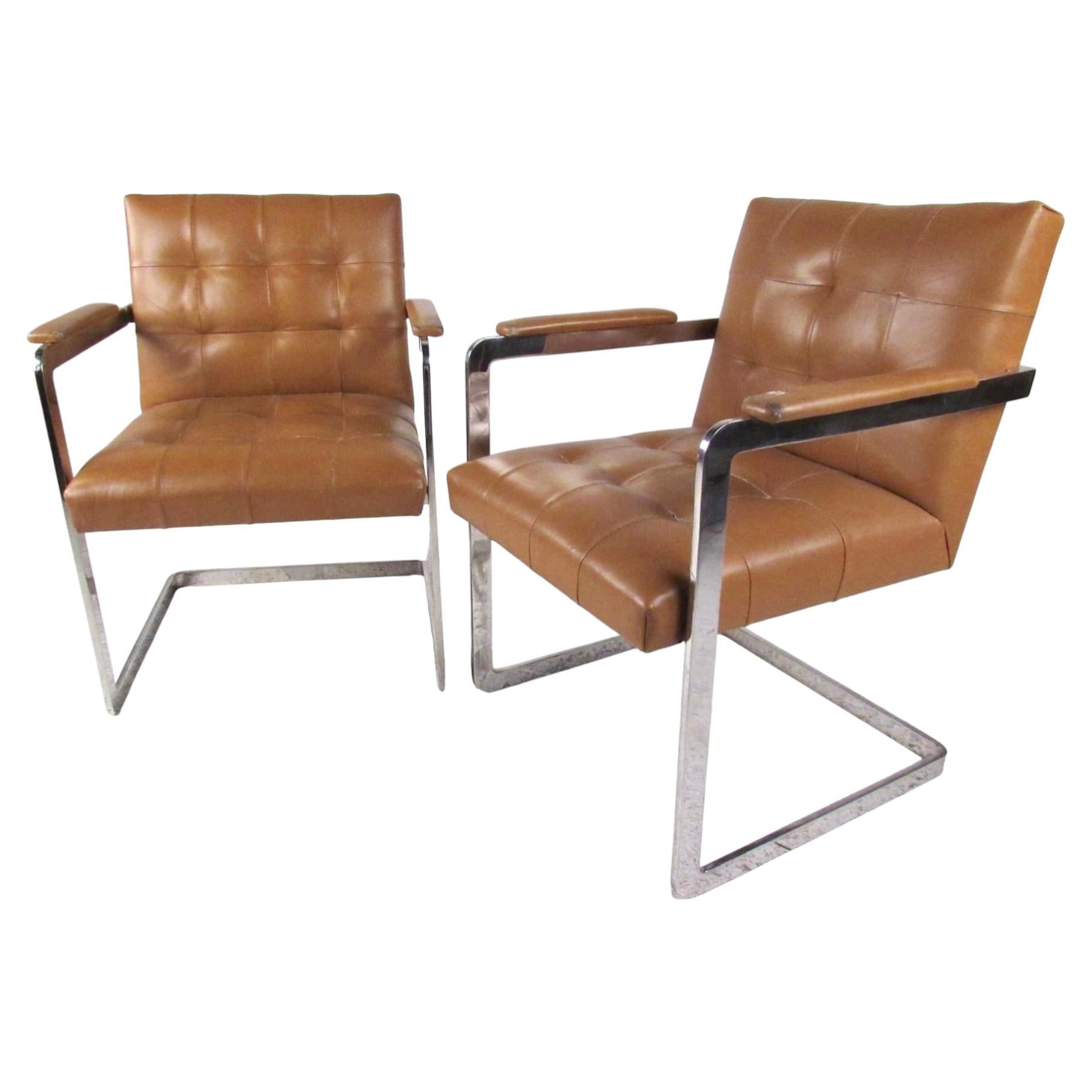 Pair of Mid-Century Leather and Chrome Tufted Style Armchairs For Sale